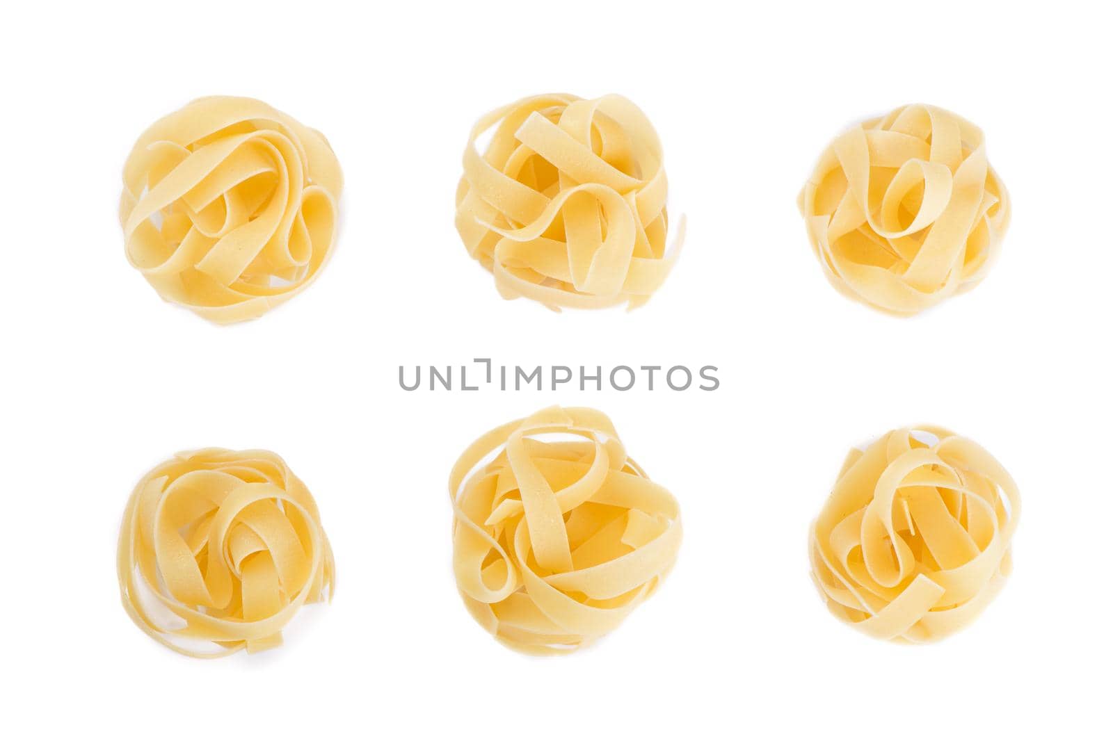 Spaghetti and basil isolated on white background. by aprilphoto