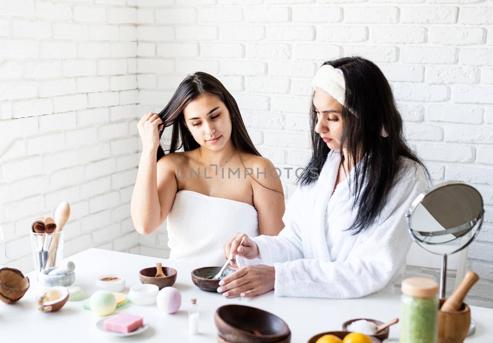 women hands making facial mask doing spa procedures by Desperada
