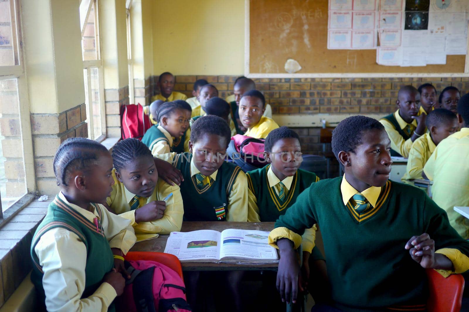 Children crammed into an overcrowded classroom in South Africa by fivepointsix