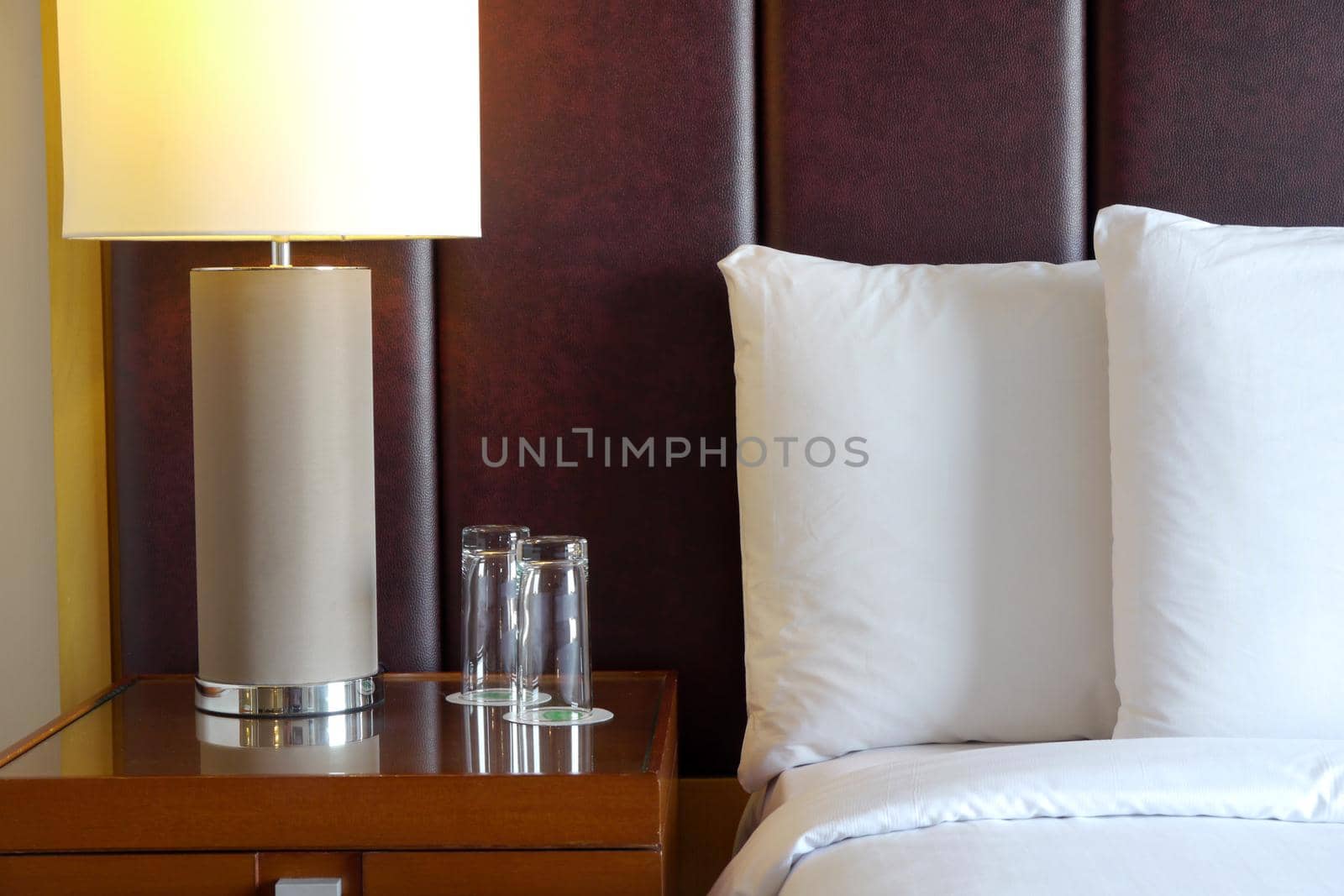 Luxury hotel bedroom with white linen