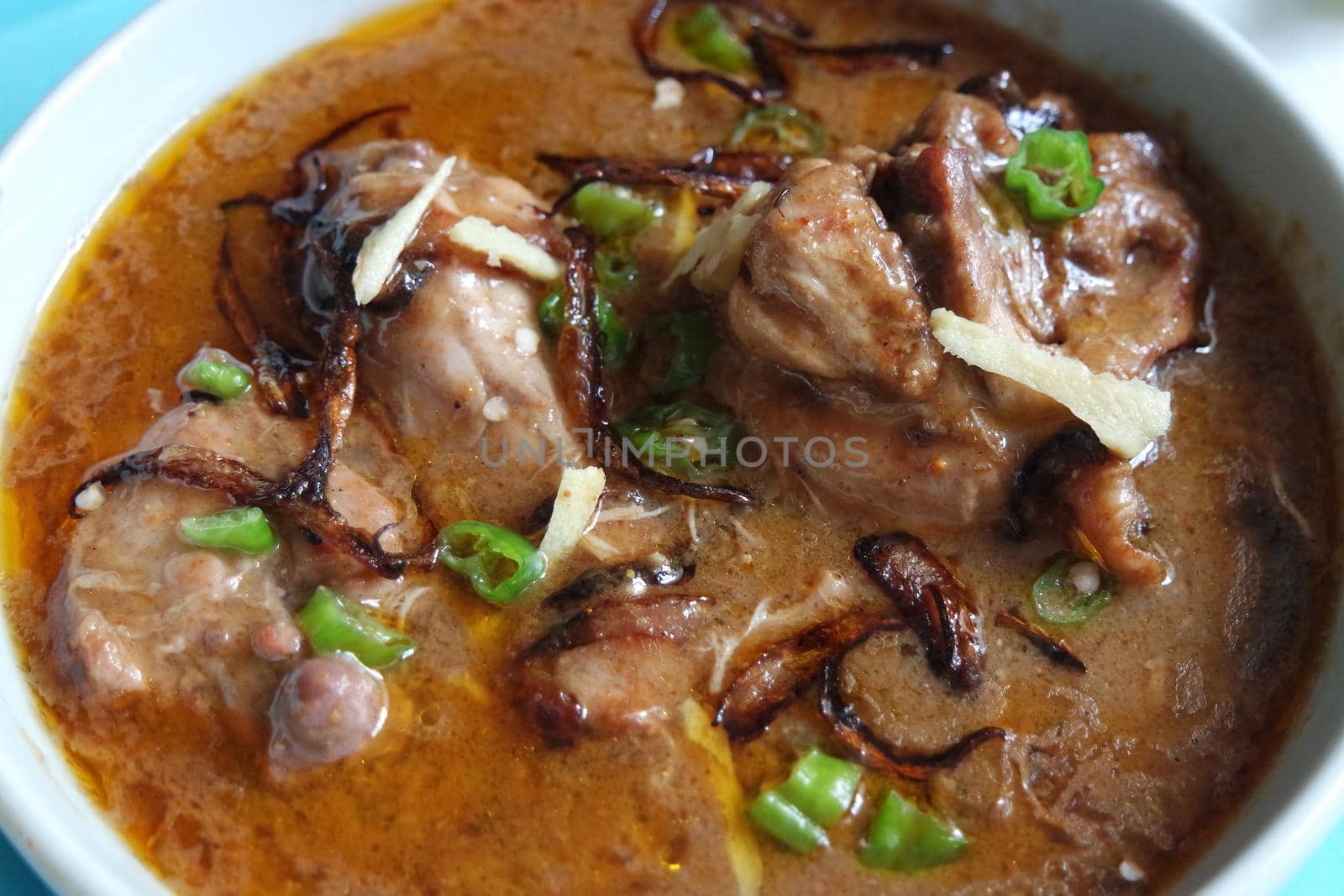 Haleem dish with salad and Lemon juice by Photochowk