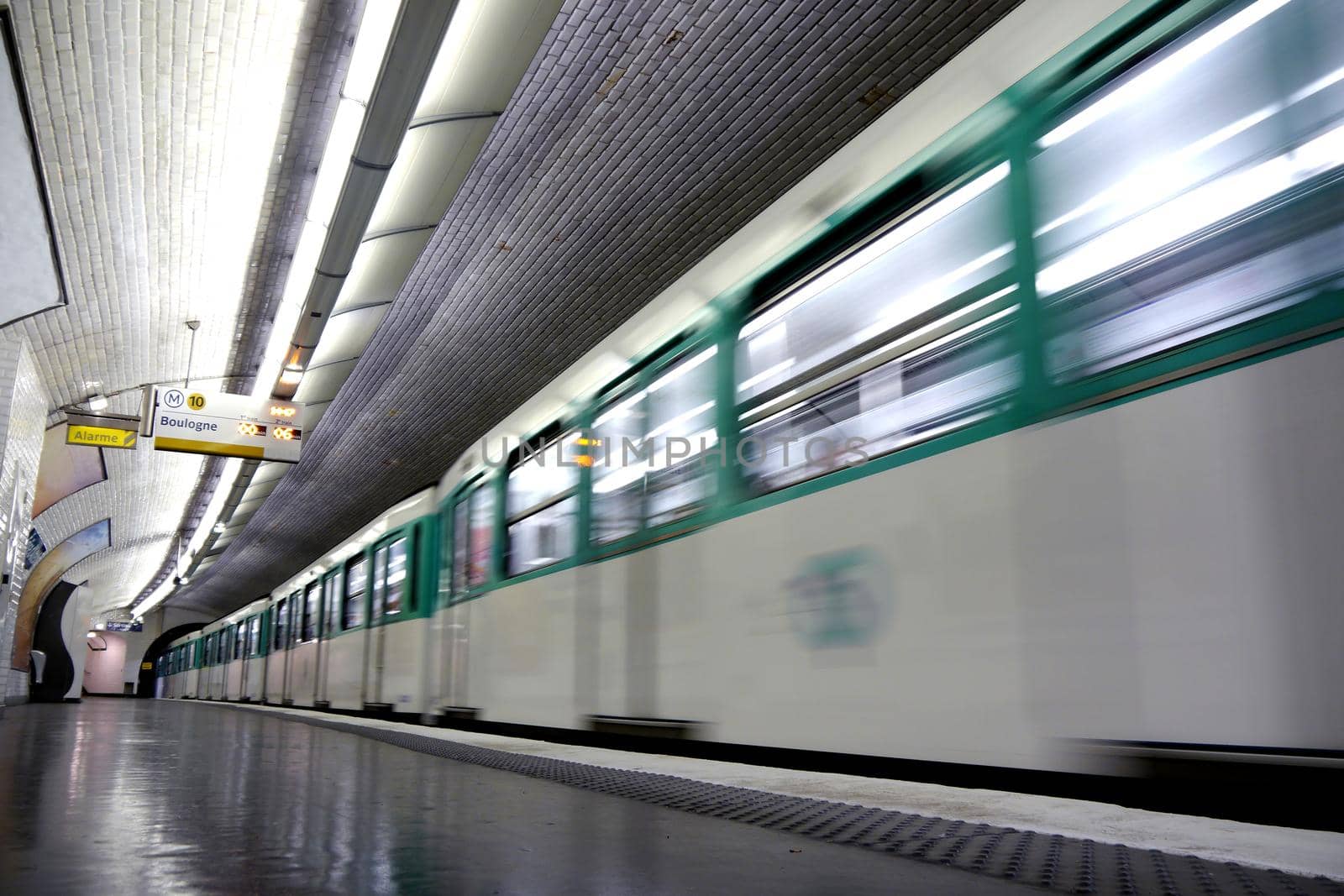 Metro train at underground station by fivepointsix