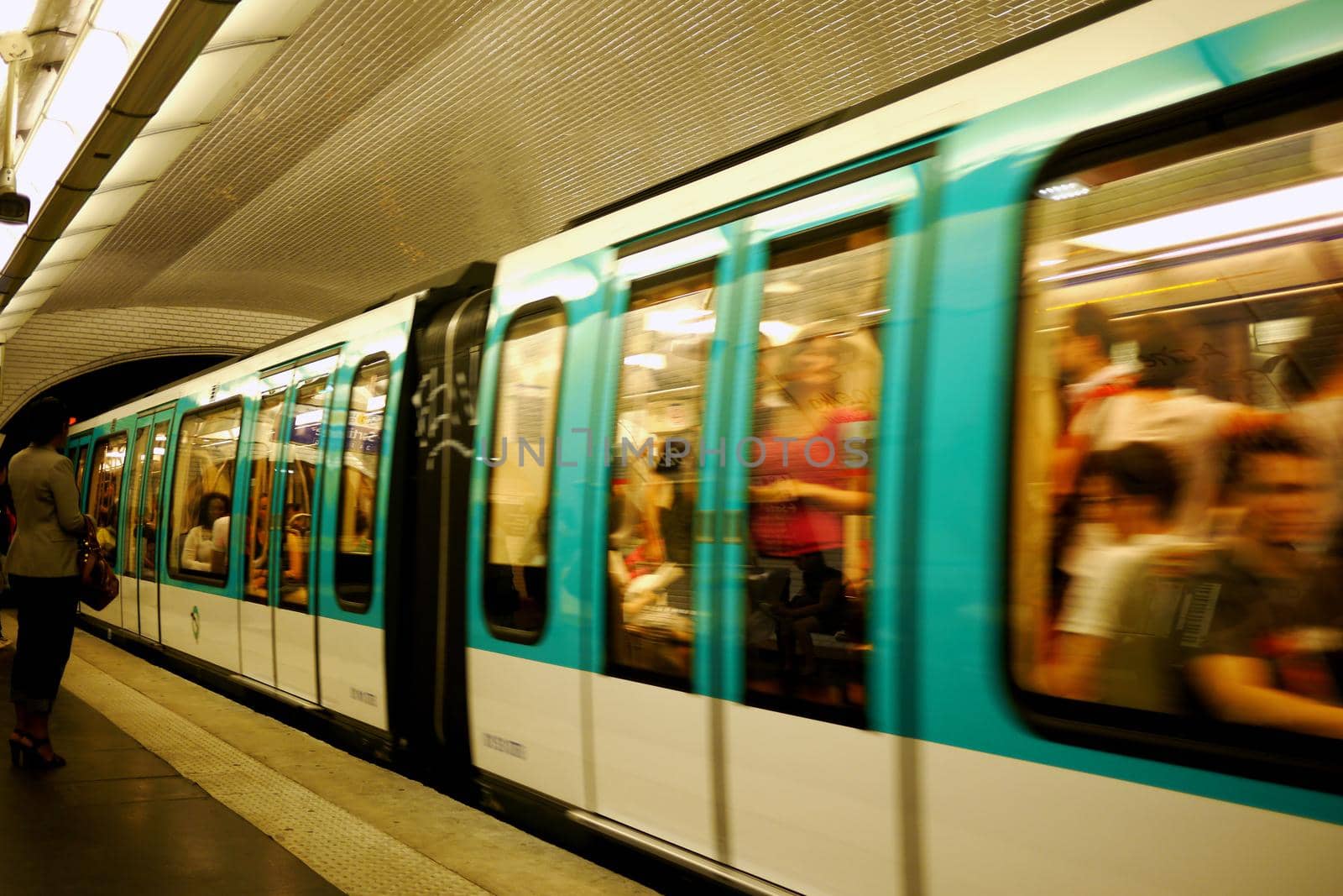 Metro train at underground station by fivepointsix