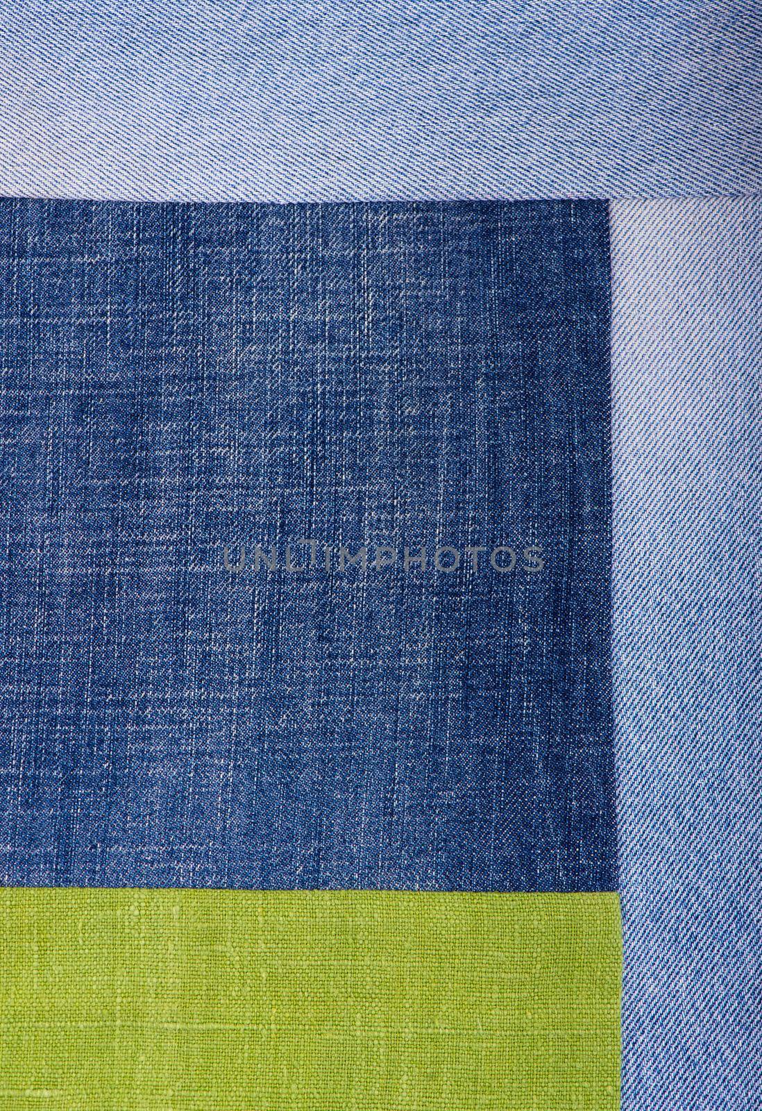 Dark blue denim background, detailed texture with vignette.