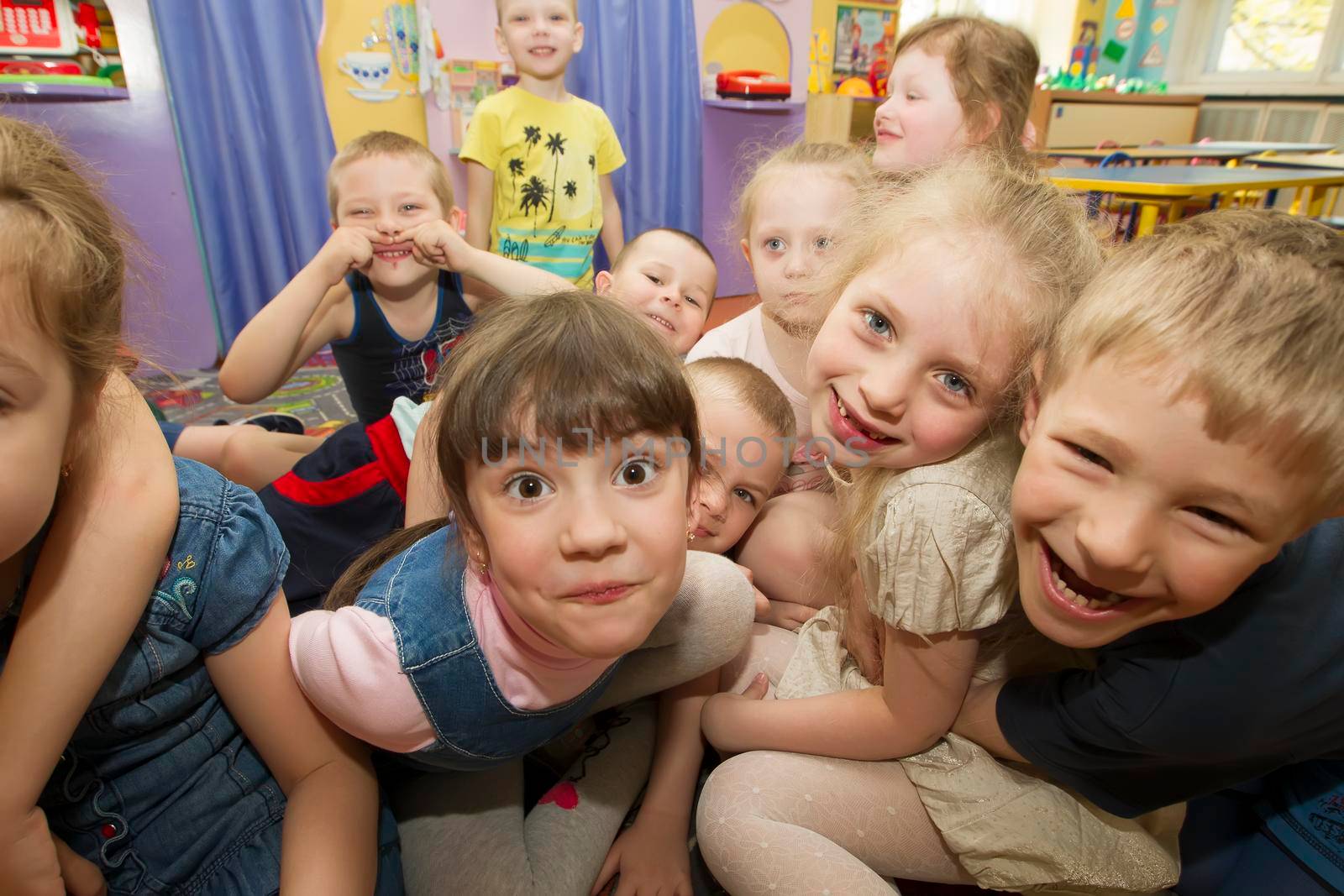 Belarus, the city of Gomil, April 25, 2019.Open day in kindergarten. Cheerful children in kindergarten. A group of six-year-old boys and girls. by Sviatlana