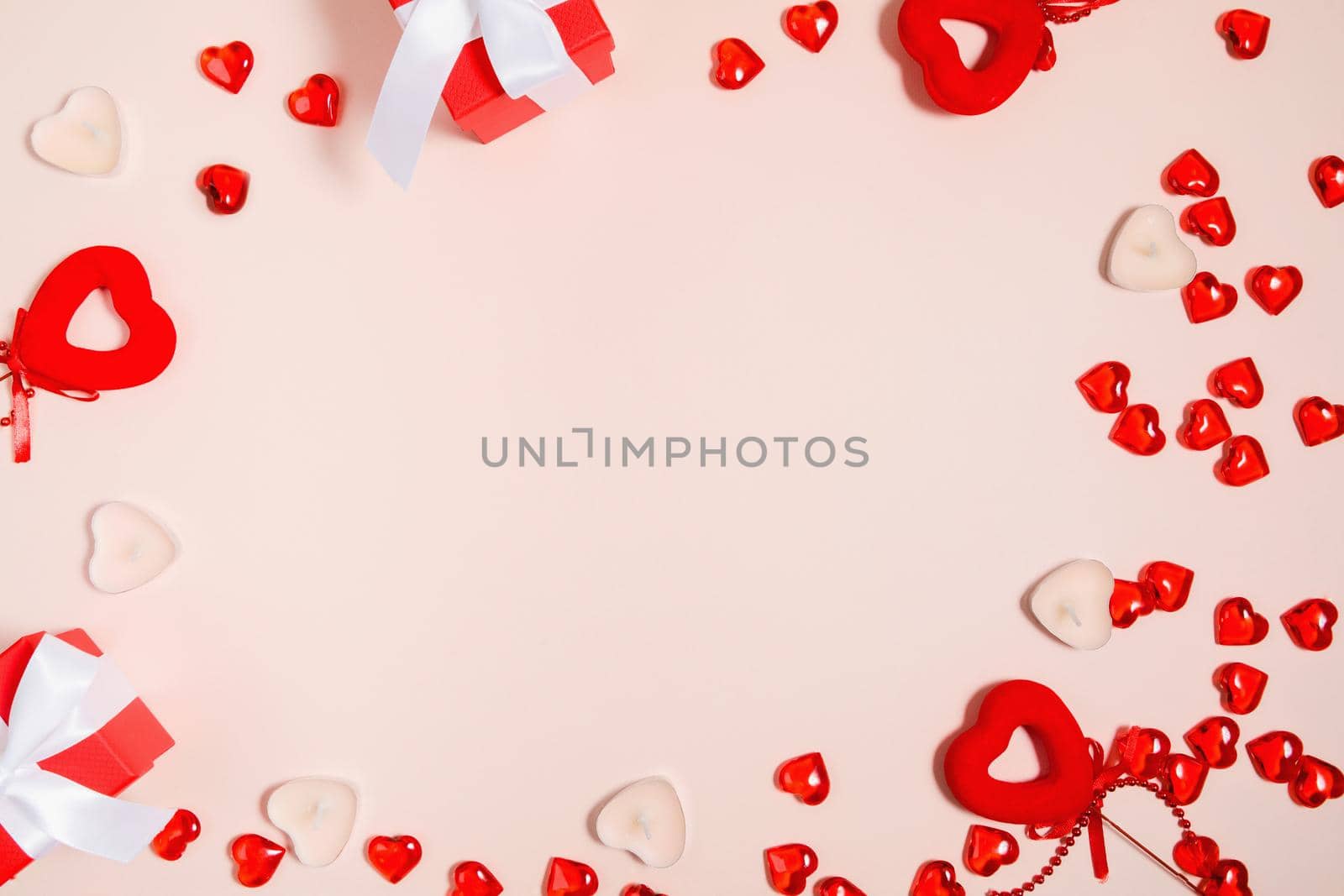 Valentine's Day, composition of hearts on a pink background. View from above. Space for text, flat lay