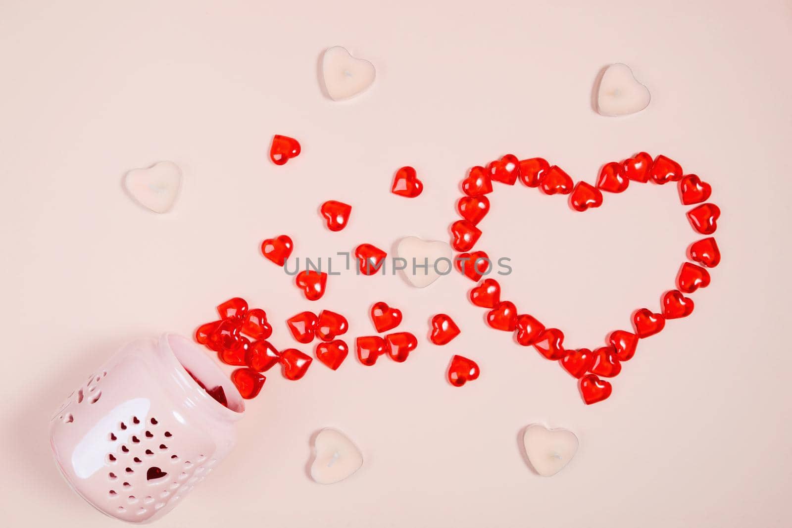 Valentine's Day, composition of hearts on a pink background. View from above. Space for text, flat lay