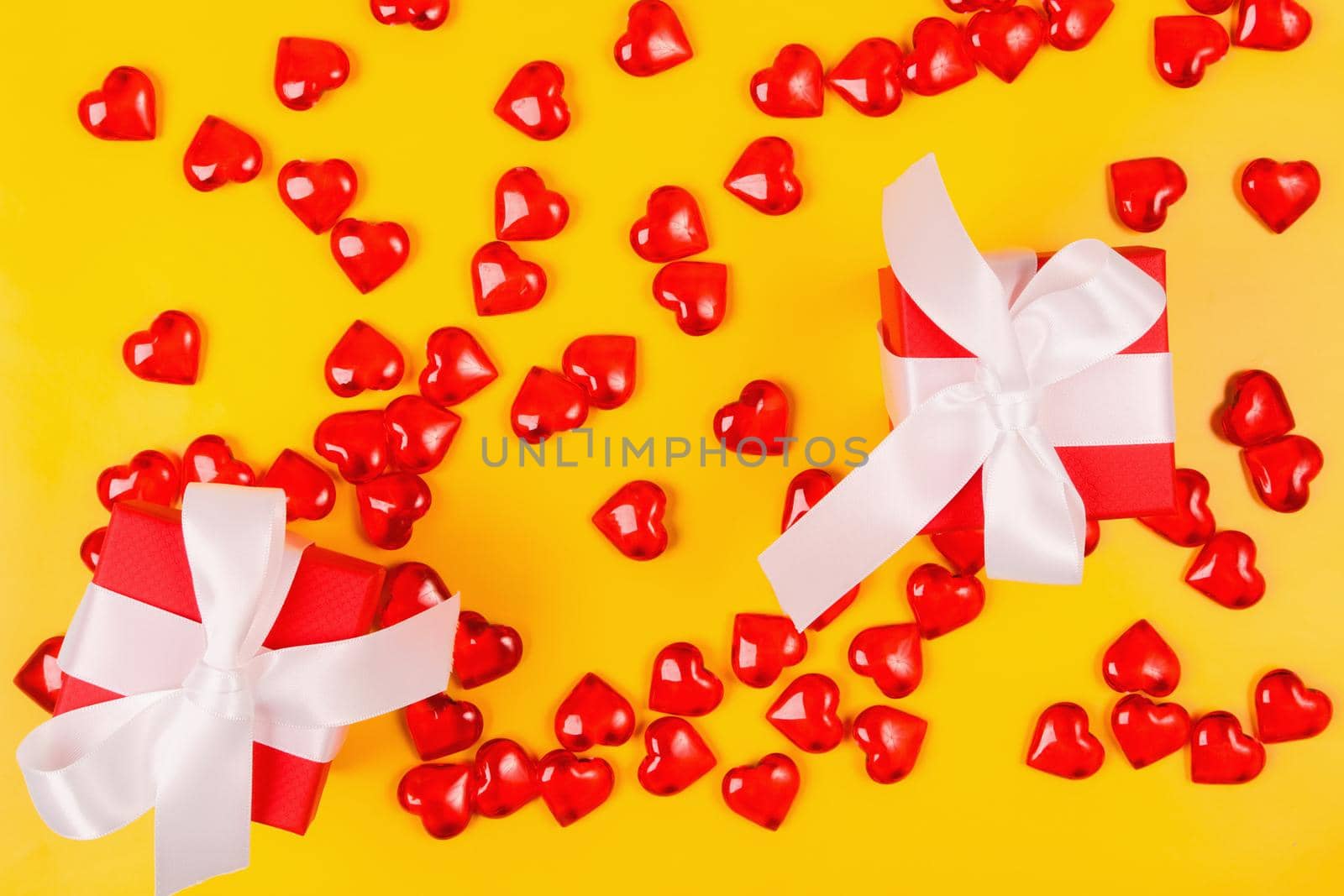Valentine's Day, composition of hearts on a yellow background. View from above. Space for text, flat lay