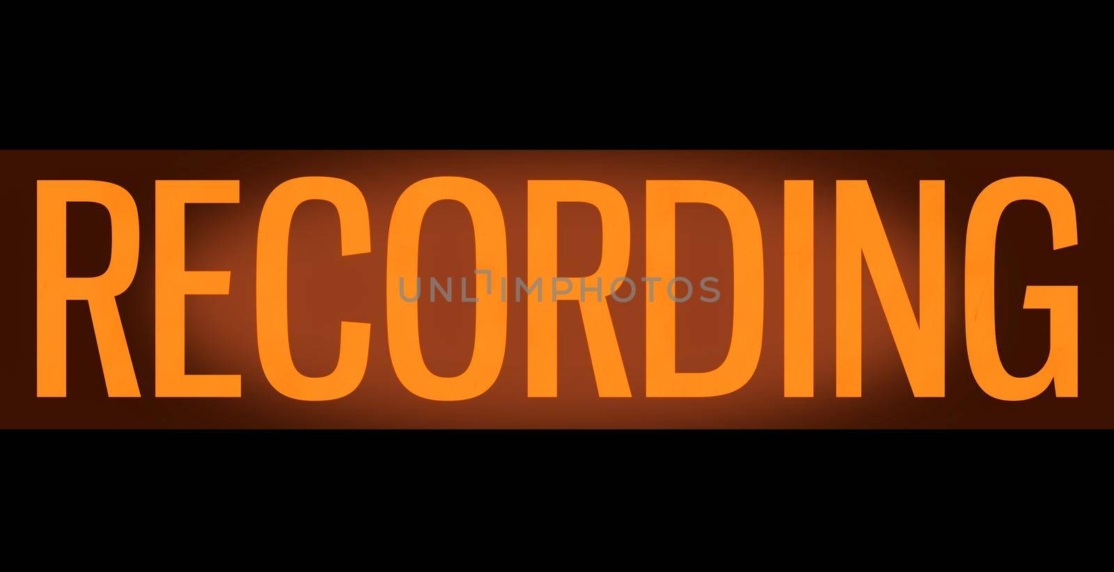 A Retro, Orange Glowing Recording Sign In A Music Studio Or Radio Or TV Station