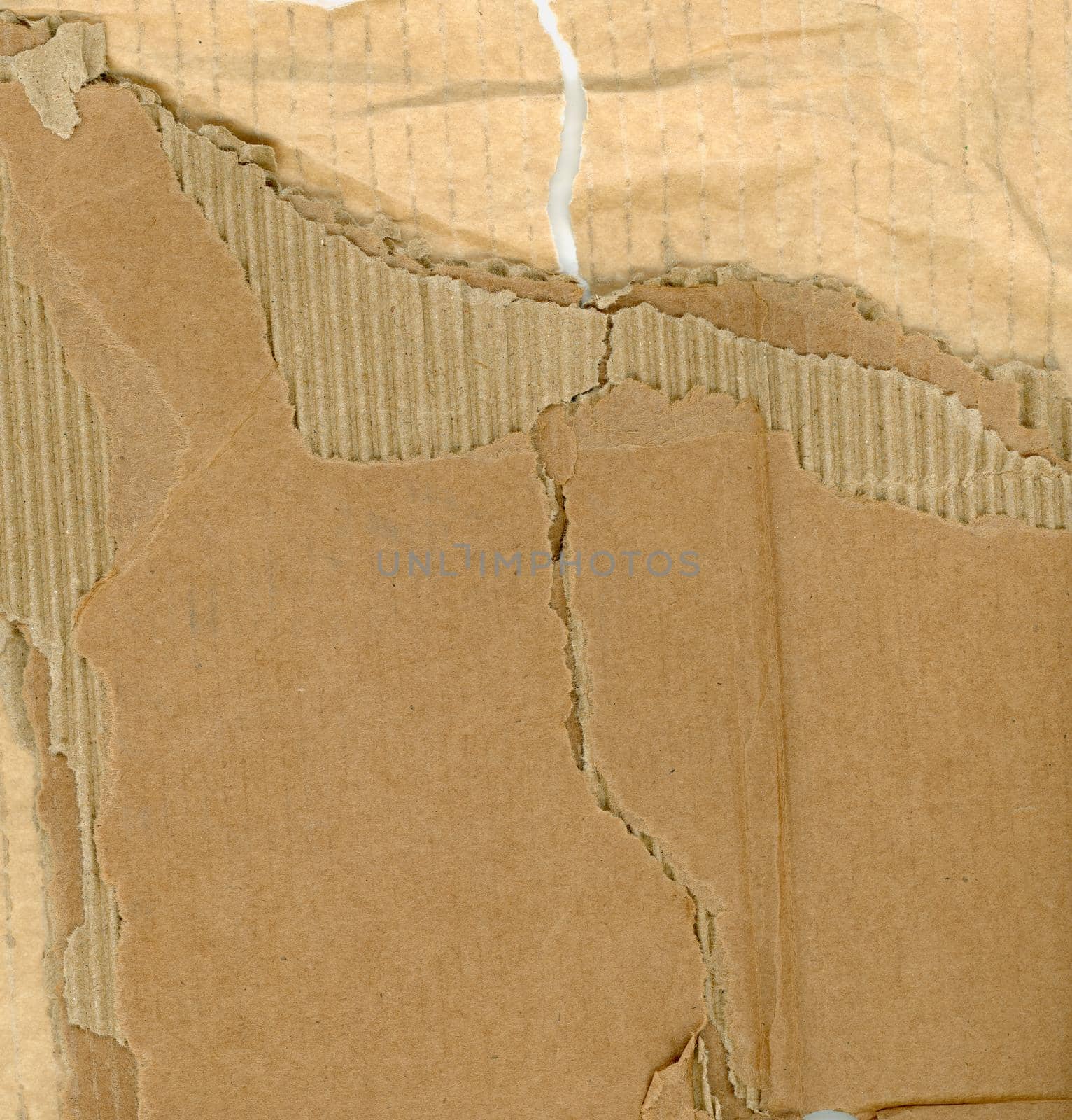 brown corrugated cardboard texture with visible layers useful as a background