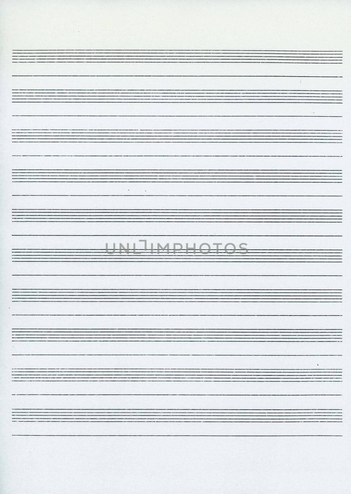 music paper preprinted with staffs for musical notation