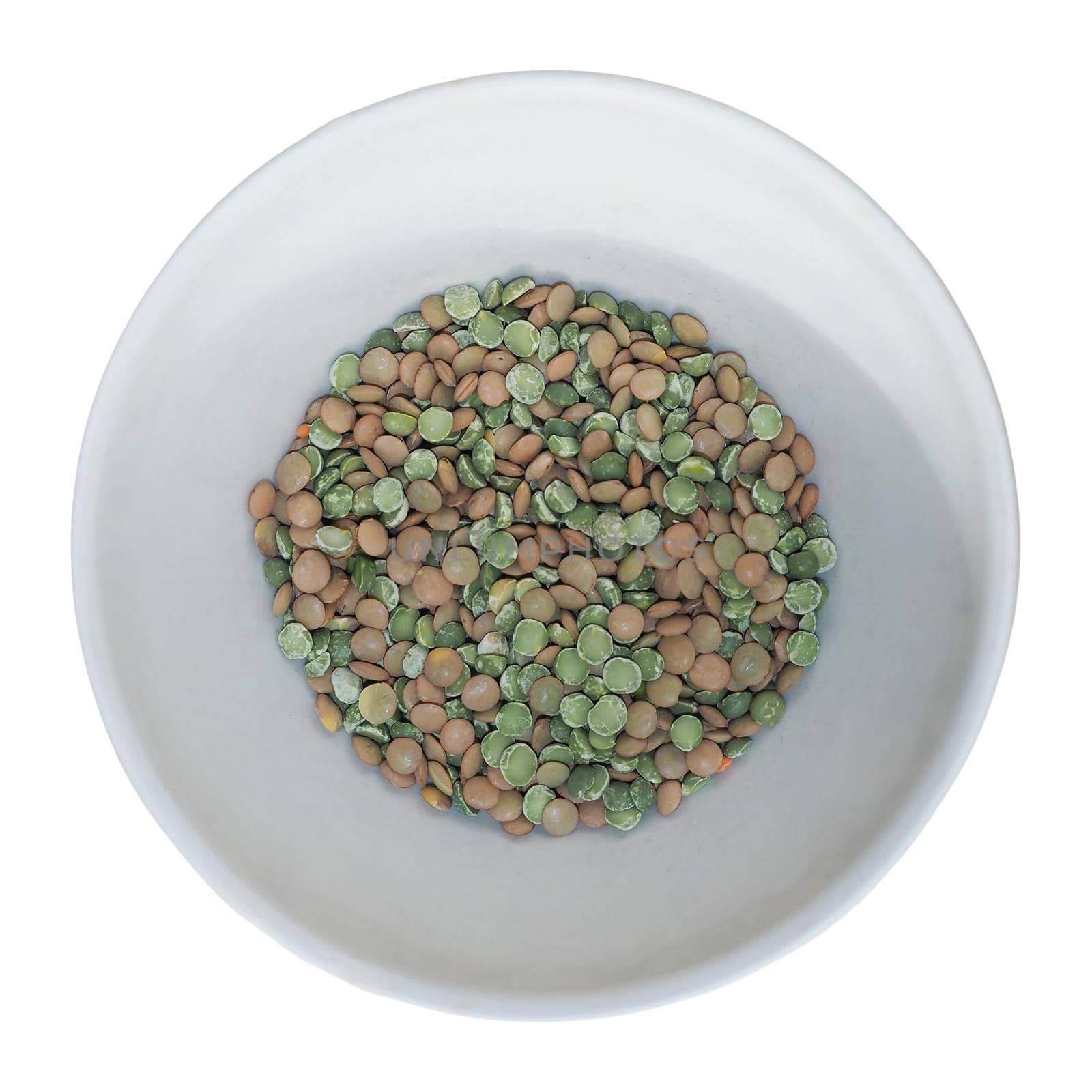 lentils and peas in a bowl isolated over white by claudiodivizia