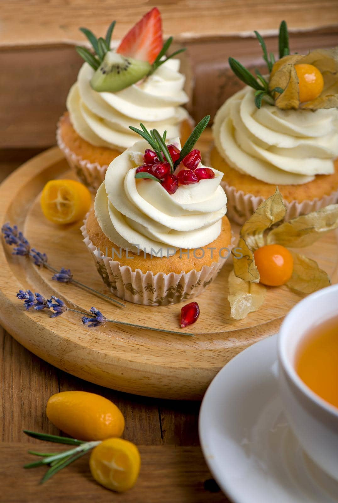 muffins with traditional fall spices. With tea cup. White marble table, copy space
