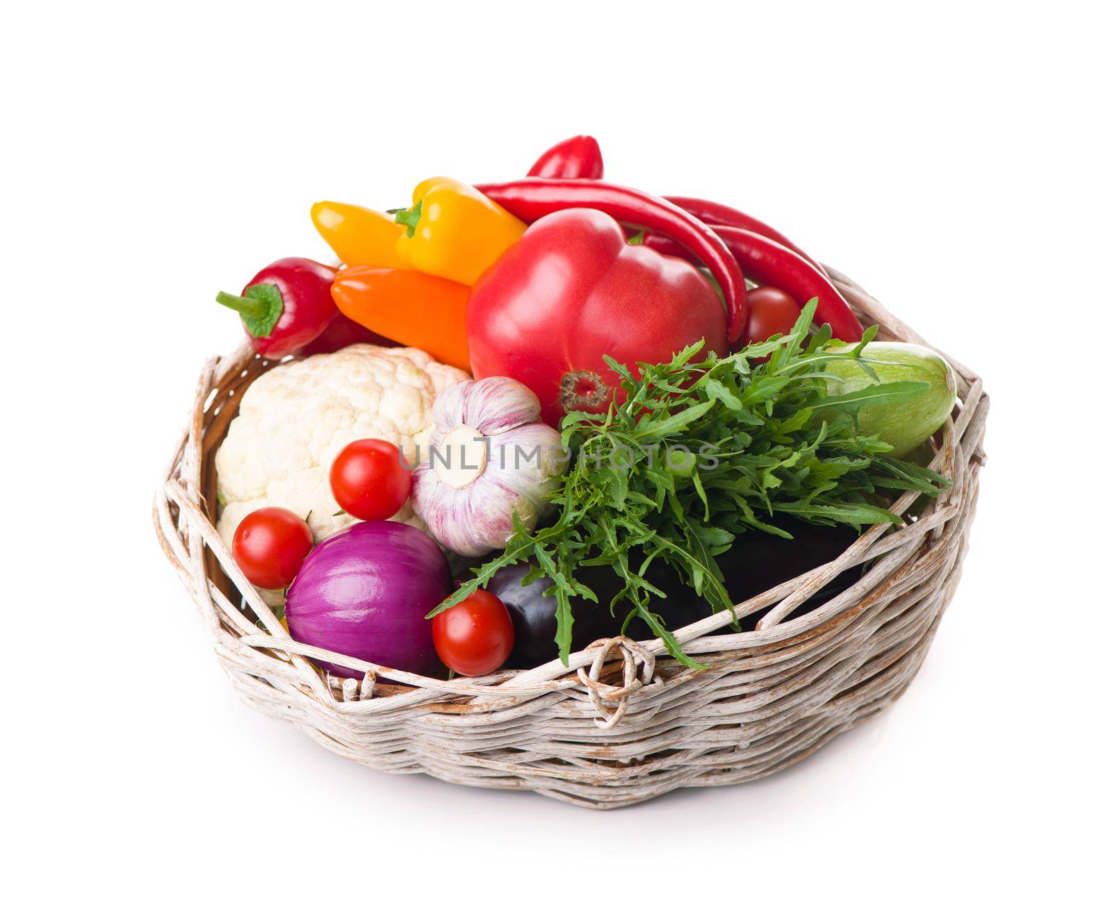 Composition with raw vegetables isolated on white.