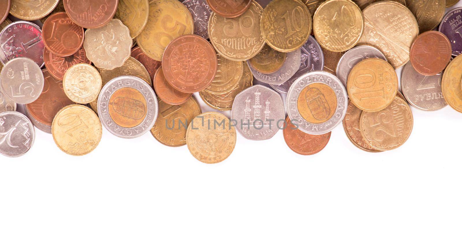Coins of different countries on a white background