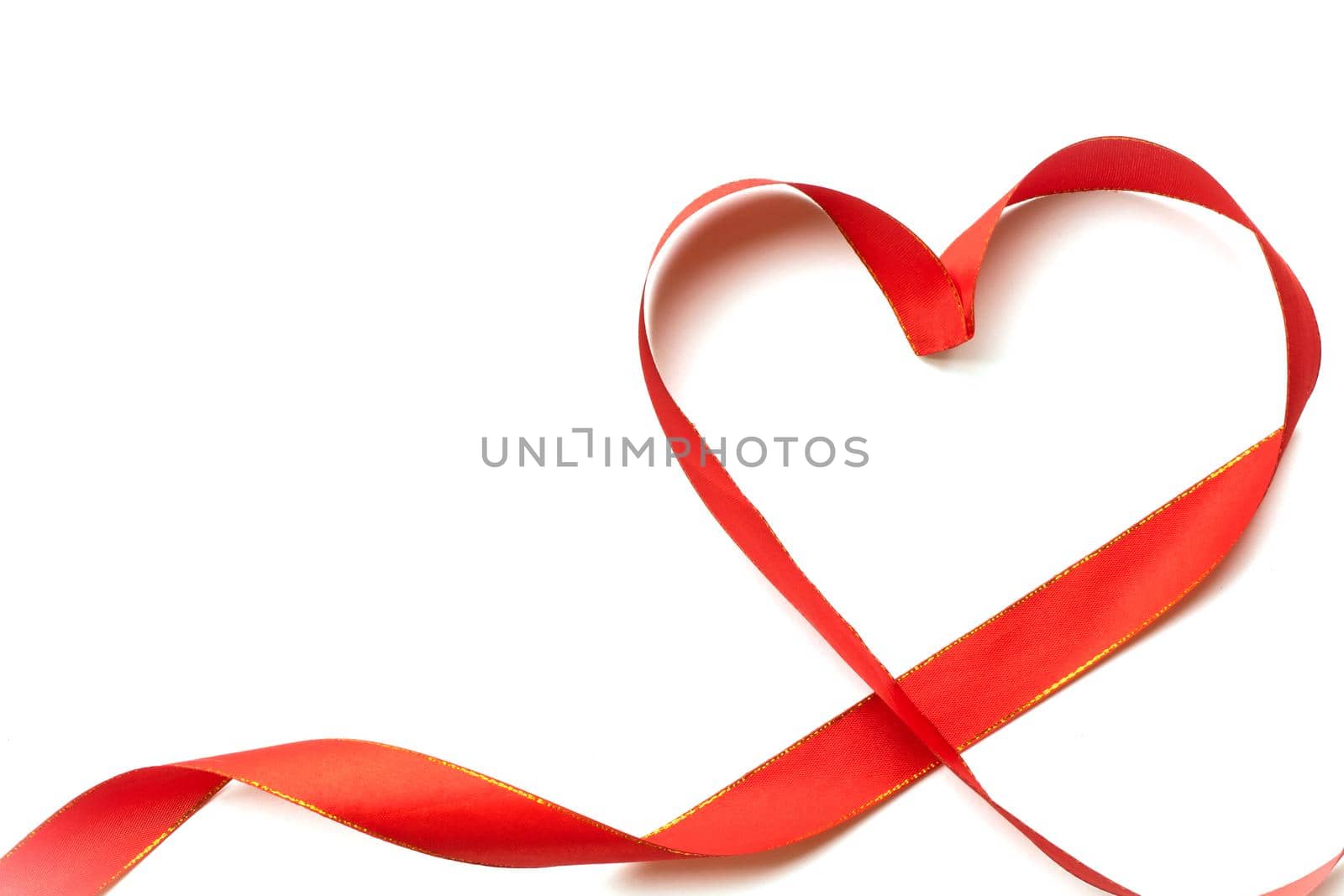 Top view of ribbon shaped as heart isolated on white background. Valentine's day concept. Copyspace