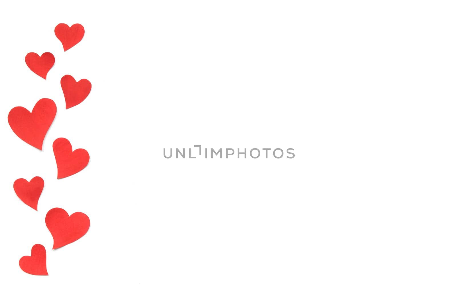 Valentines Day card background, border of red cute hearts made of paper. White background with hearts in paper cut in different size. Valentine Day romantic. Copyspace