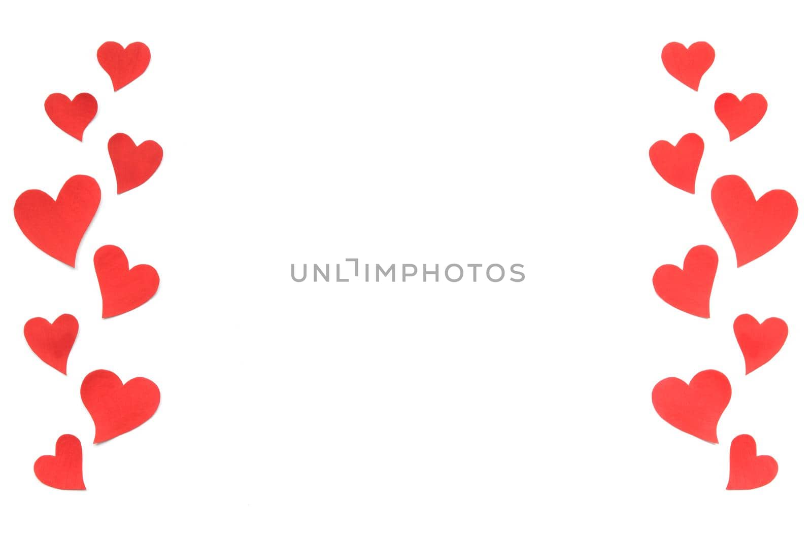 Valentines Day card background, border of red cute hearts made of paper. White background with hearts in paper cut in different size. Valentine Day romantic. Copyspace