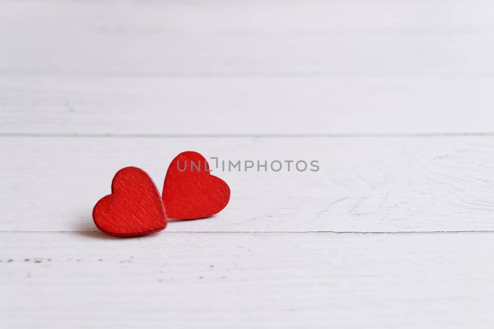 Valentines day card with red hearts on a wooden background, love message. Love concept. Romantic. Copyspace