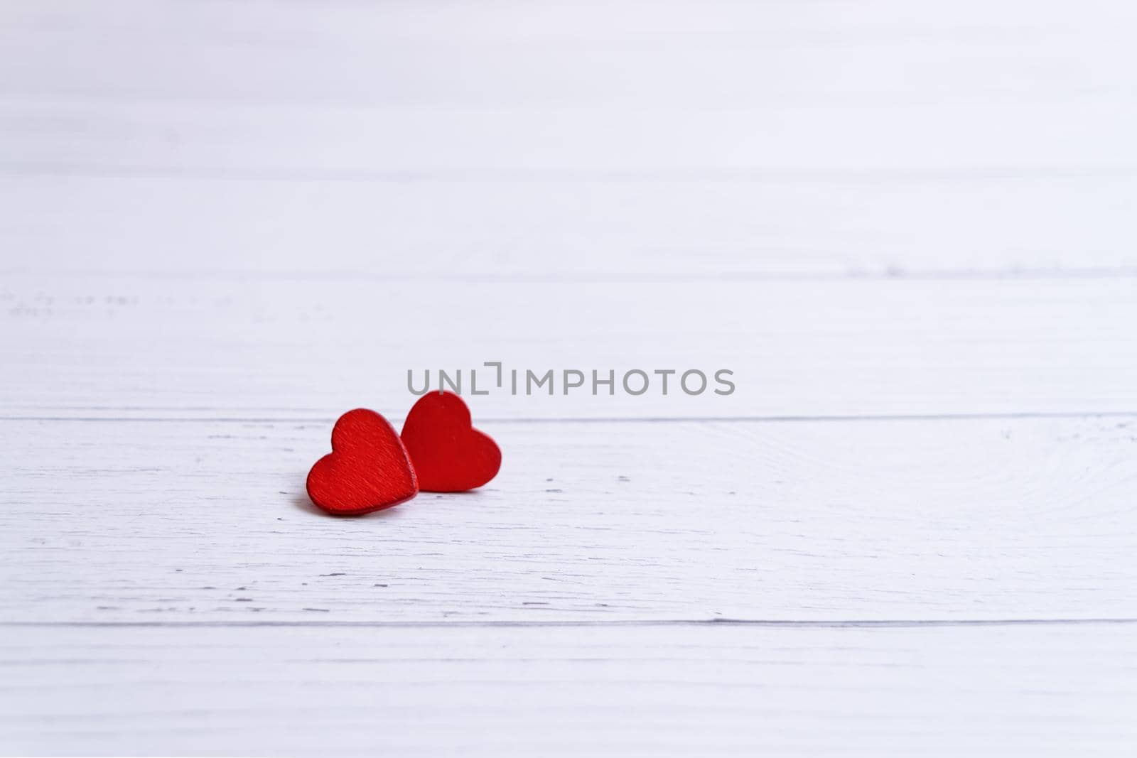 Valentines day card with red hearts on a wooden background, love message. Love concept. Romantic. Copyspace