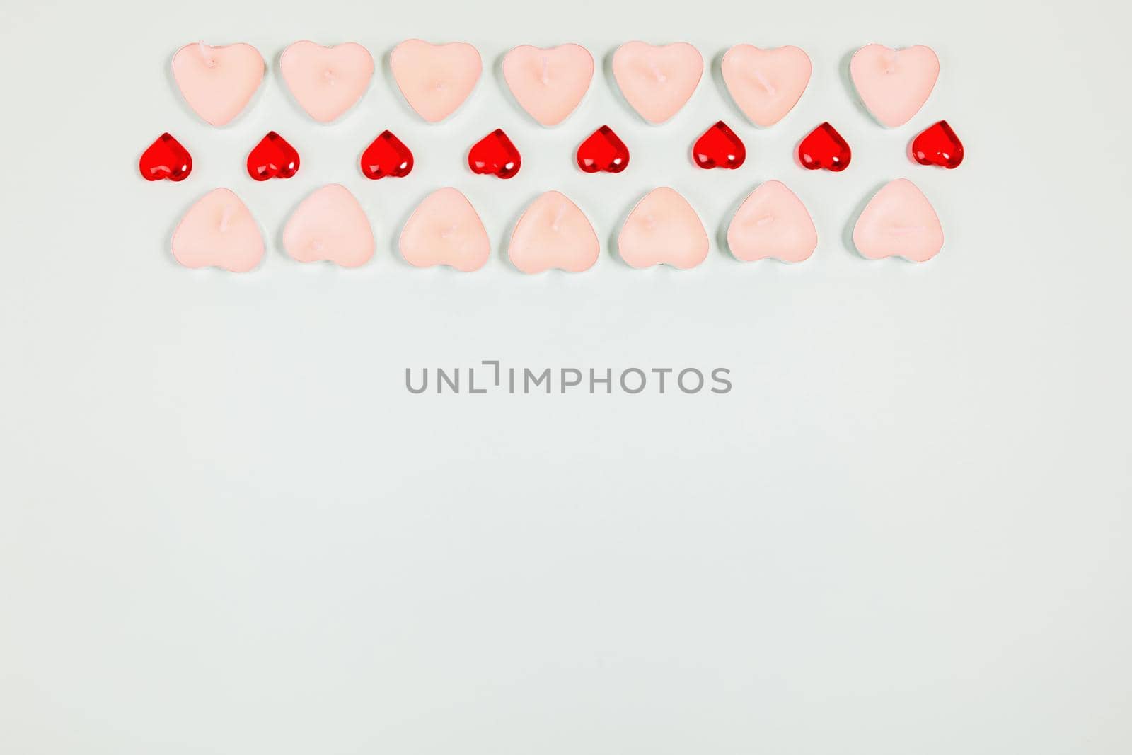 Valentine's Day, composition of hearts on a blue background. View from above. Space for text, flat lay