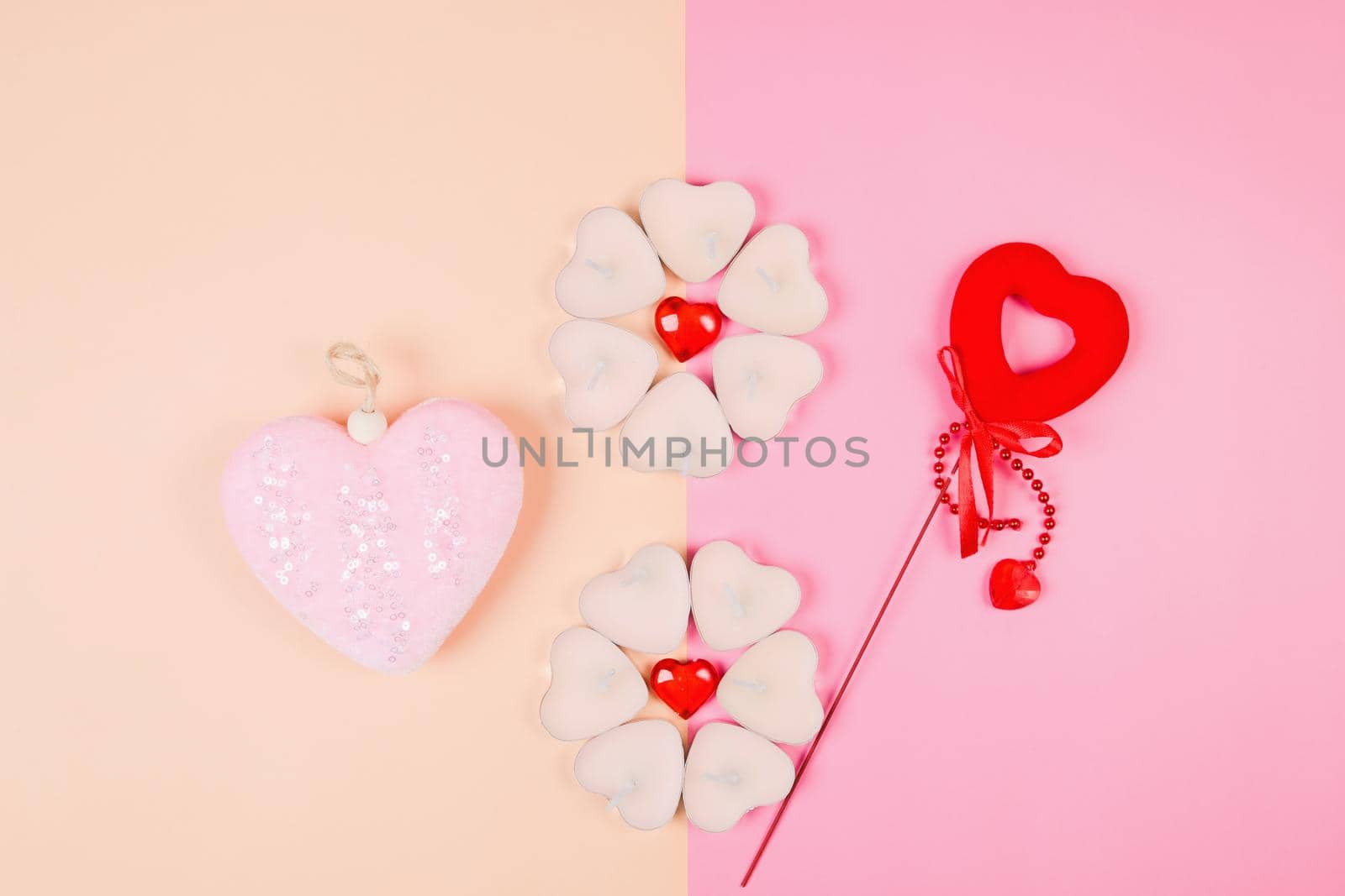 Valentine's Day, composition of hearts on a pink background. View from above. Space for text, flat lay