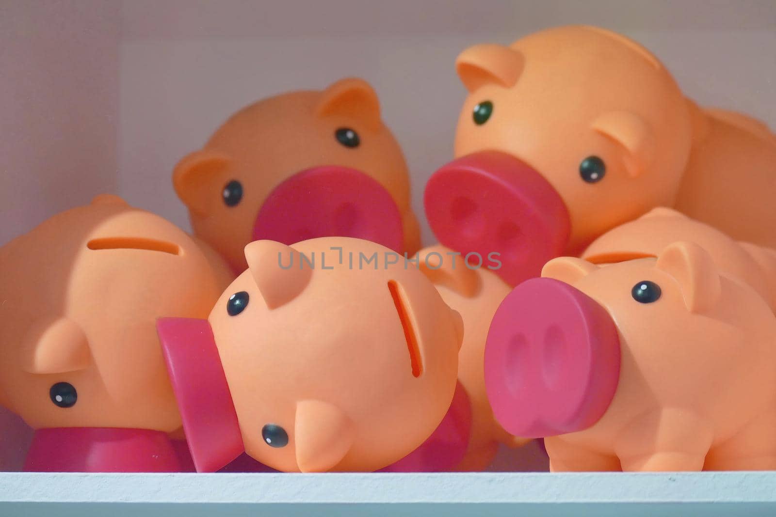 Toy piggy banks closeup view by lemar