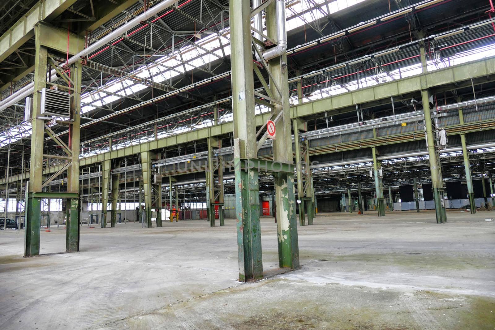 Empty abandoned industrial plant interior view