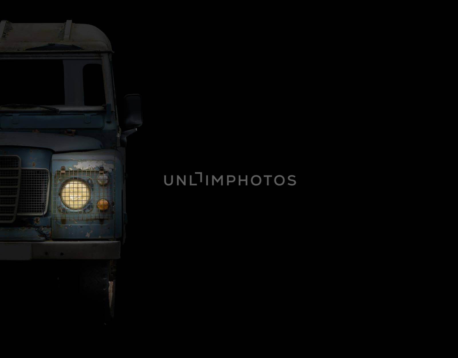 A Truck With Headlamp On At Night With Copy Space