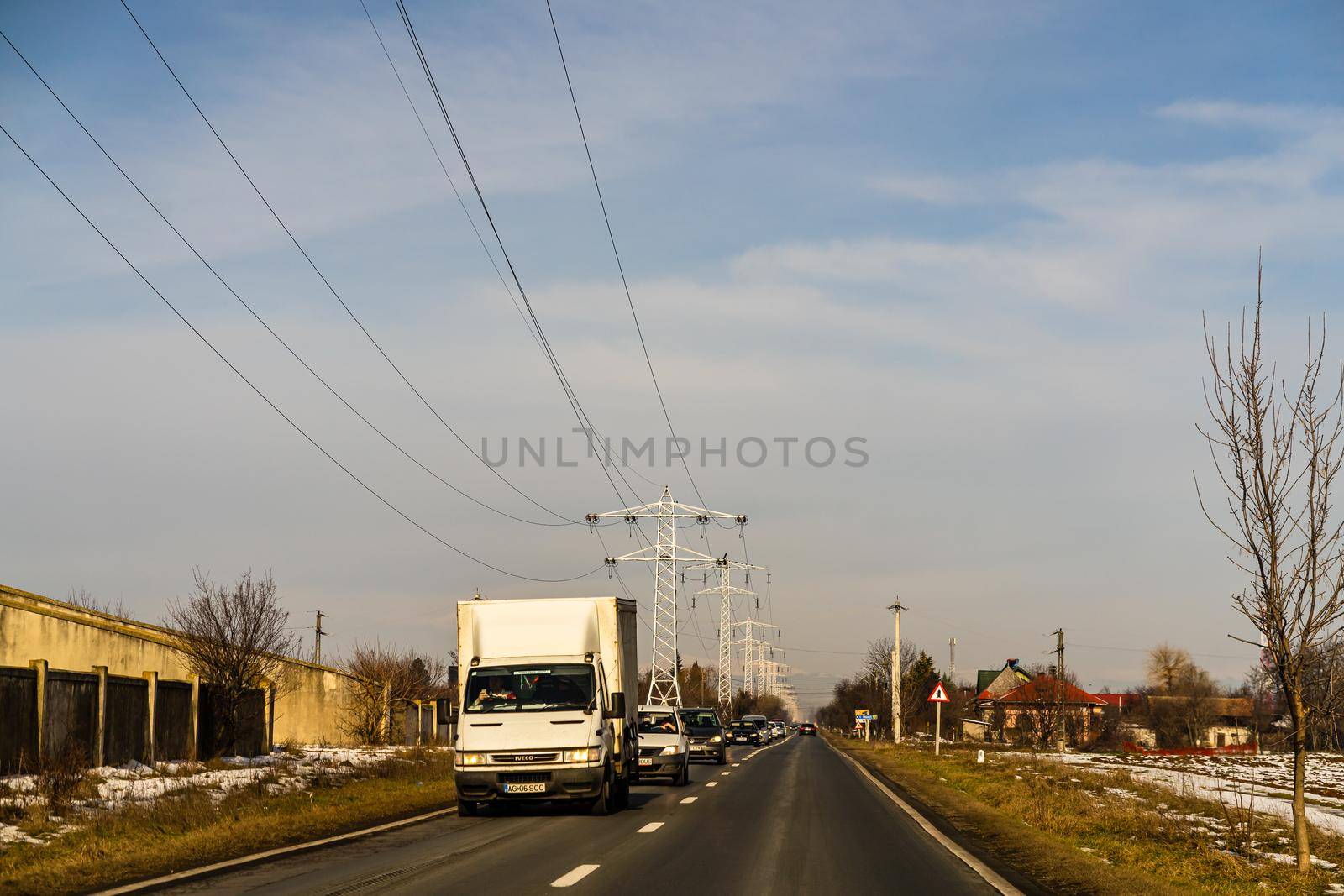 Road view through car windshield, cars on road in traffic in Bucharest, Romania, 2021