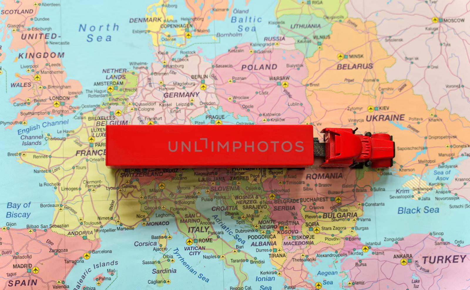 Truck with trailer on the Europe map. by dmitrimaruta