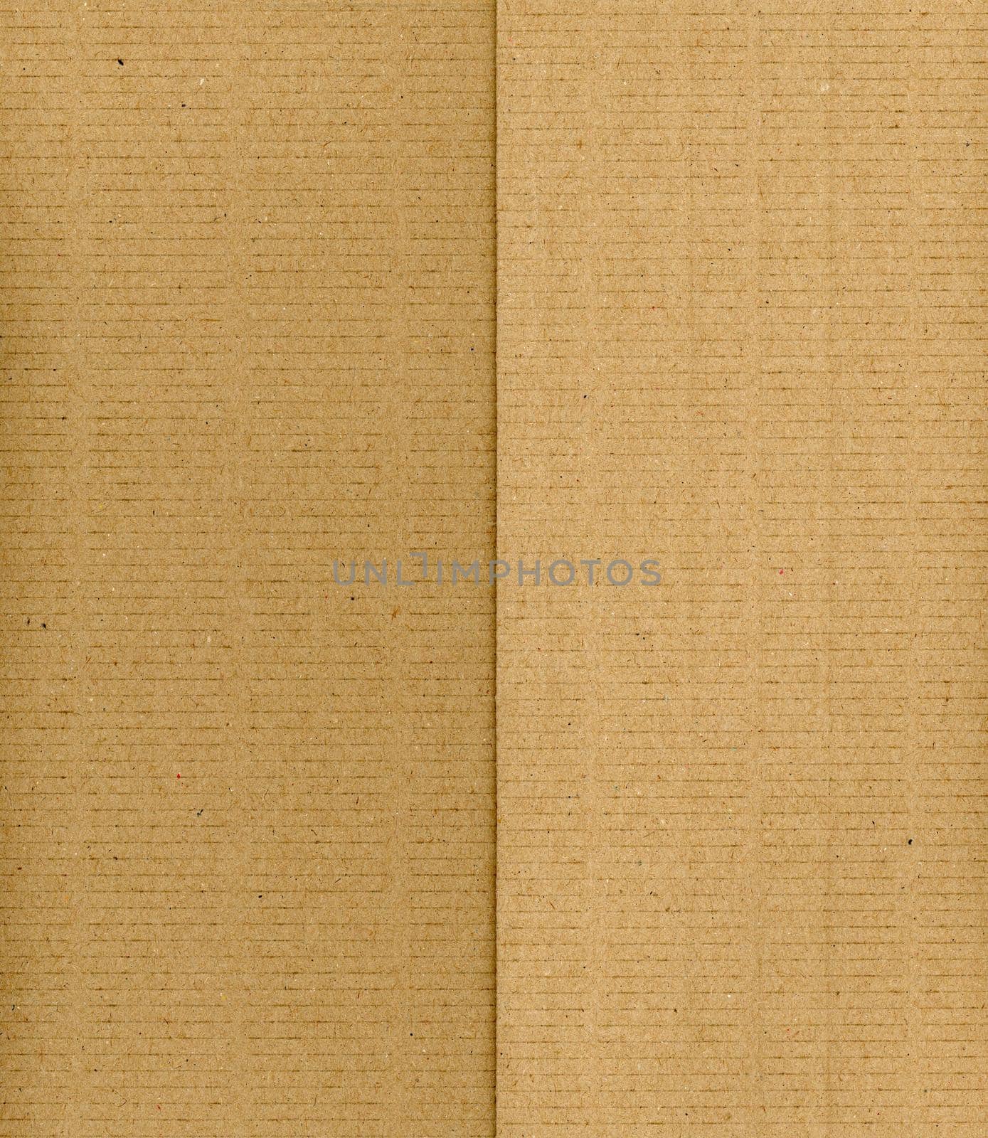 brown corrugated cardboard texture background by claudiodivizia