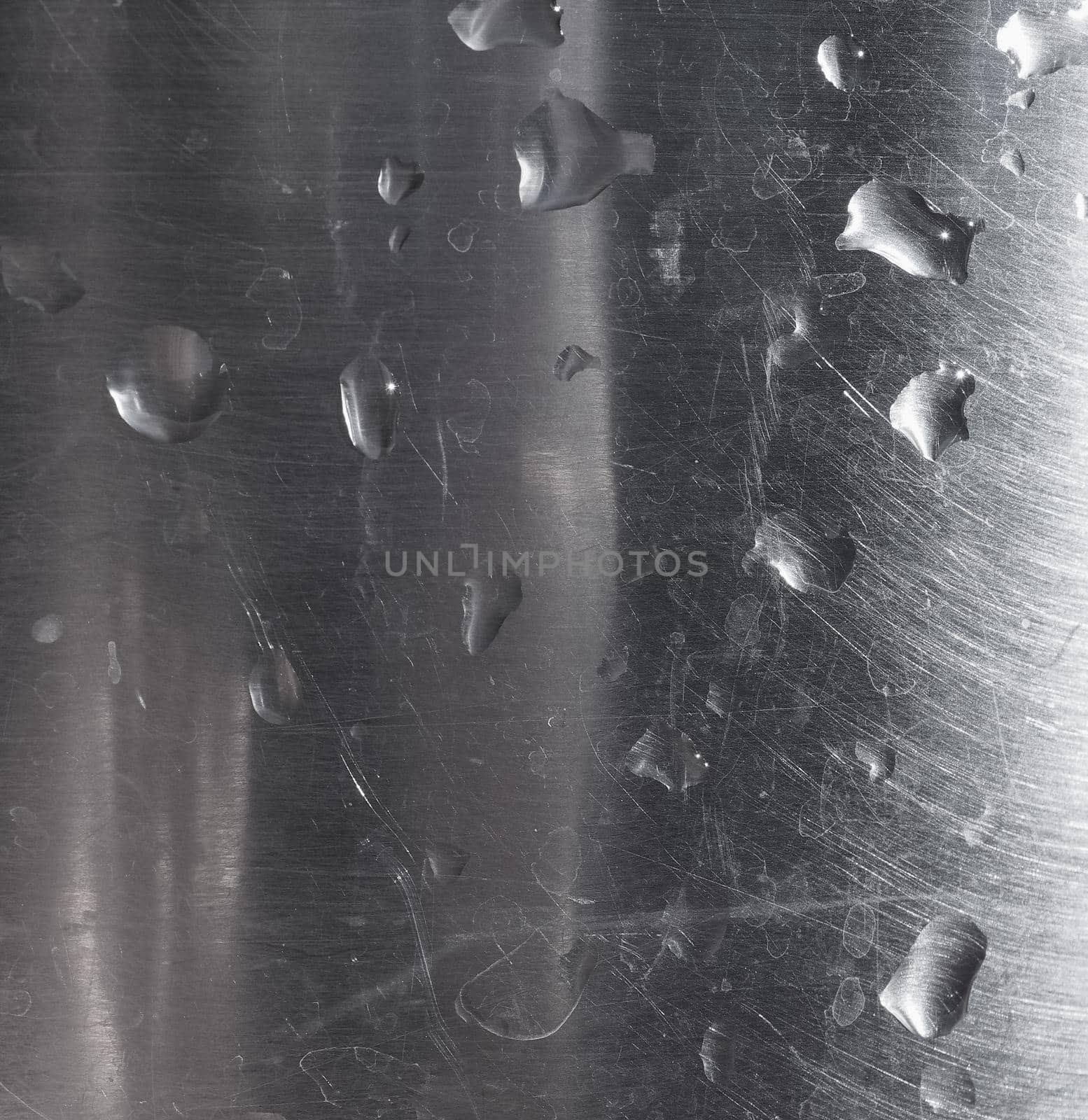 water drops on grey steel texture background by claudiodivizia