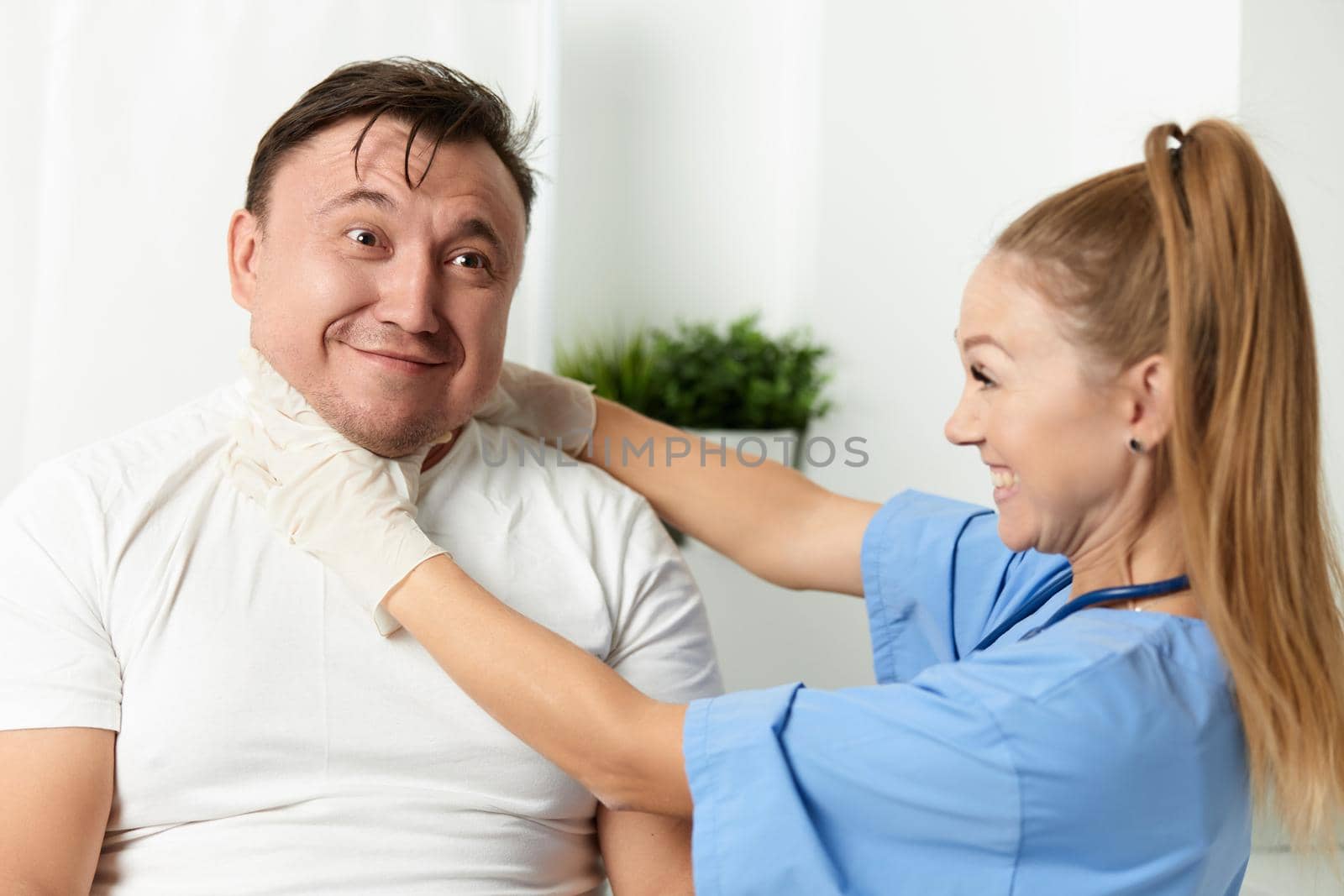 female doctor chokes patient emotions hospital health by SHOTPRIME