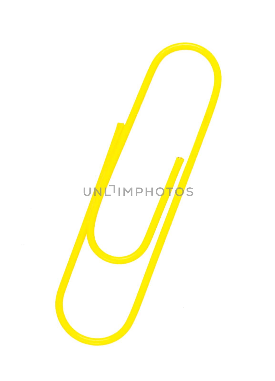 yellow paper clip on a white background