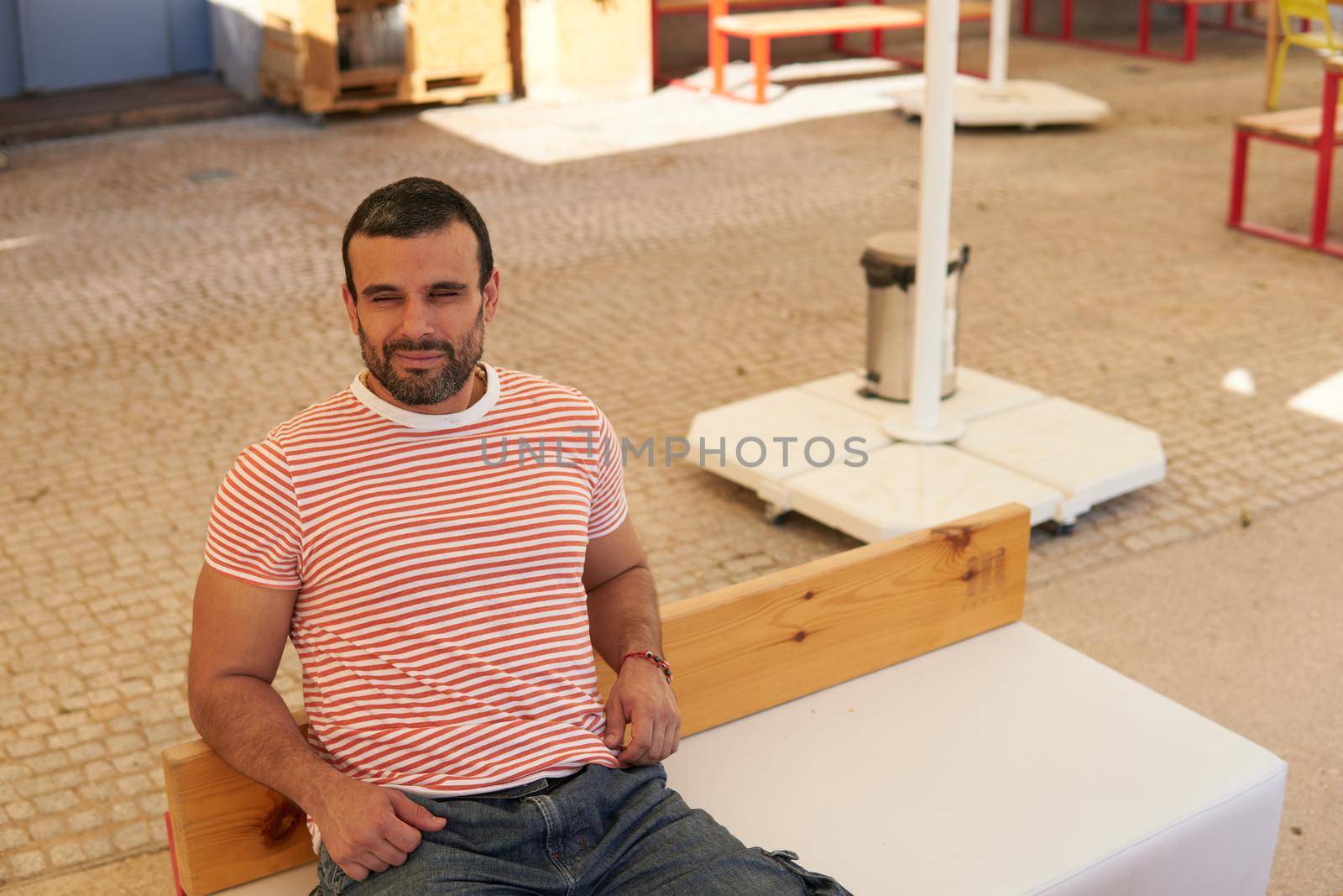 Man sitting on a terrace in summer