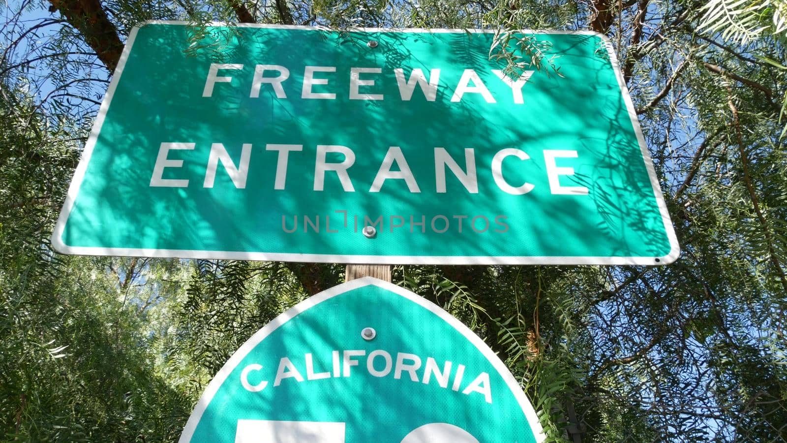 Freeway entrance sign on interchange crossraod in San Diego county, California USA. State Route highway 78 signpost plate. Symbol of road trip, transportation and traffic safety rules and regulations.
