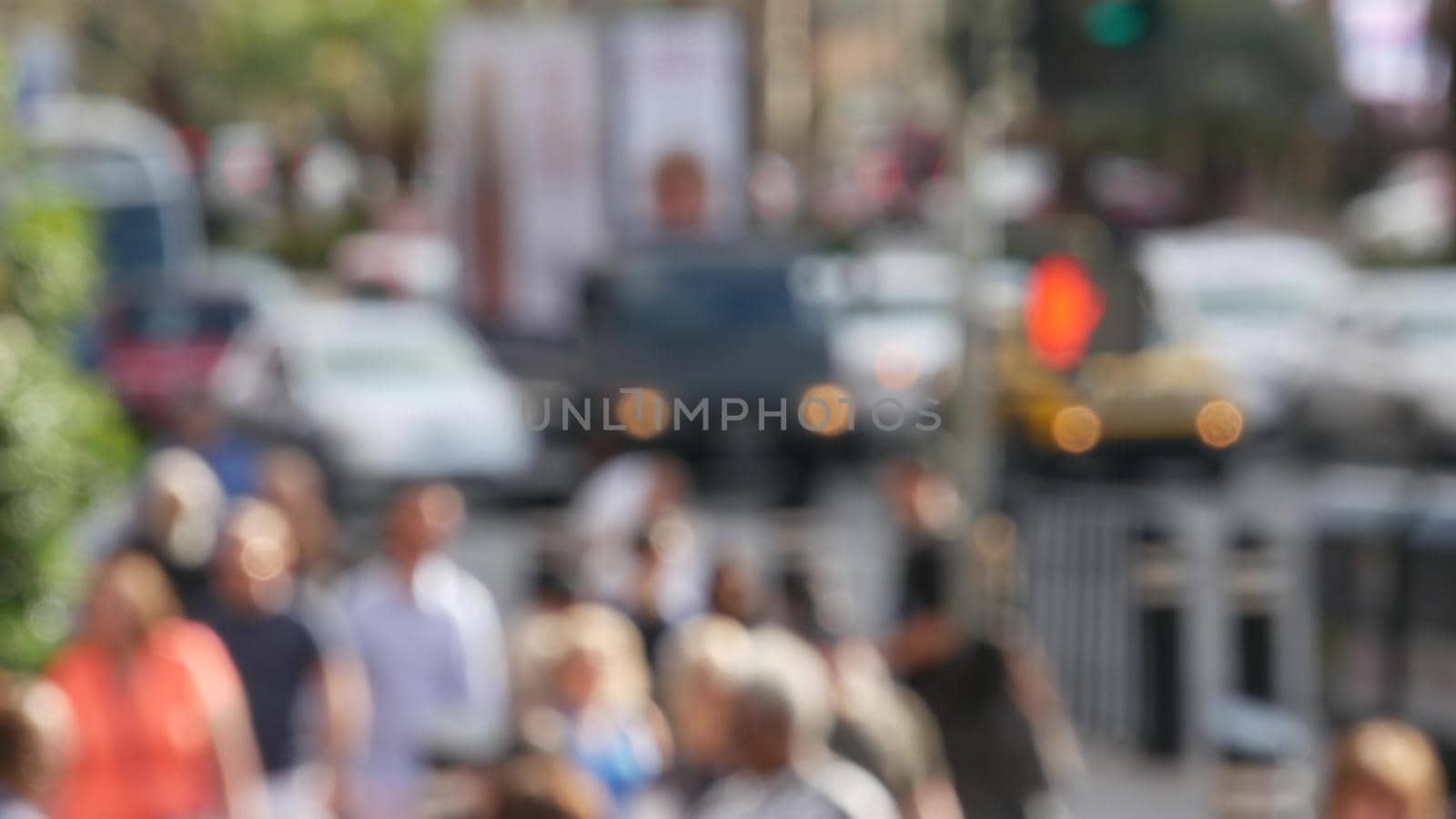 Defocused crowd of people, road intersection crosswalk on The Strip of Las Vegas, USA. Anonymous blurred pedestrians on walkway in crowded urban downtown. Unrecognizable american citizens in sin city.