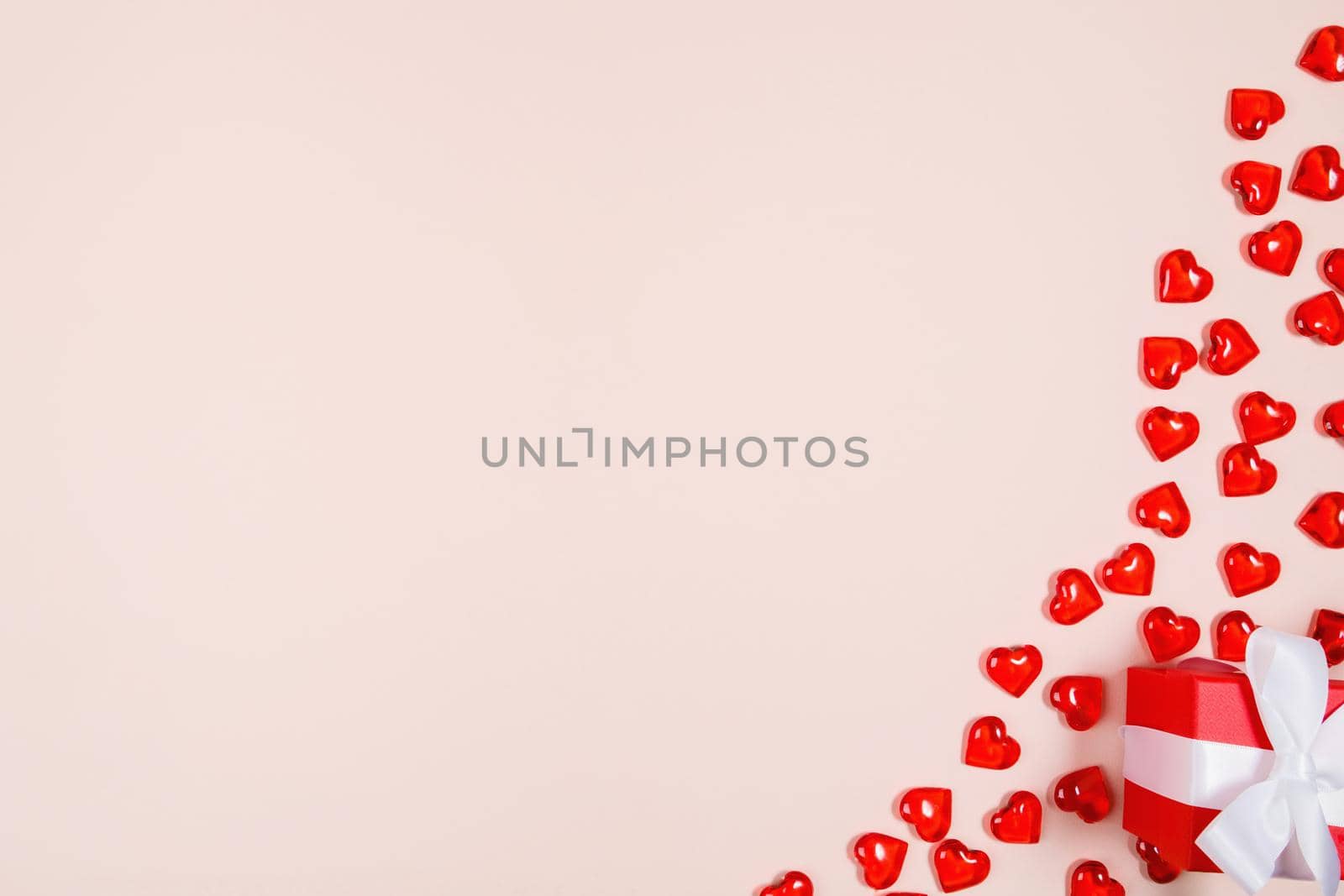 Valentine's Day, composition of hearts on a pink background. View from above. Space for text, flat lay