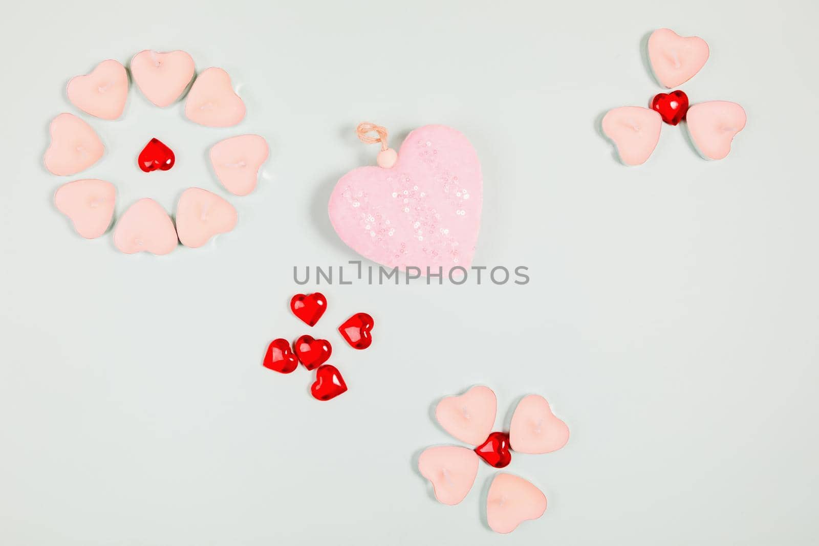 Valentine's Day, composition of hearts on a blue background. View from above. Space for text, flat lay