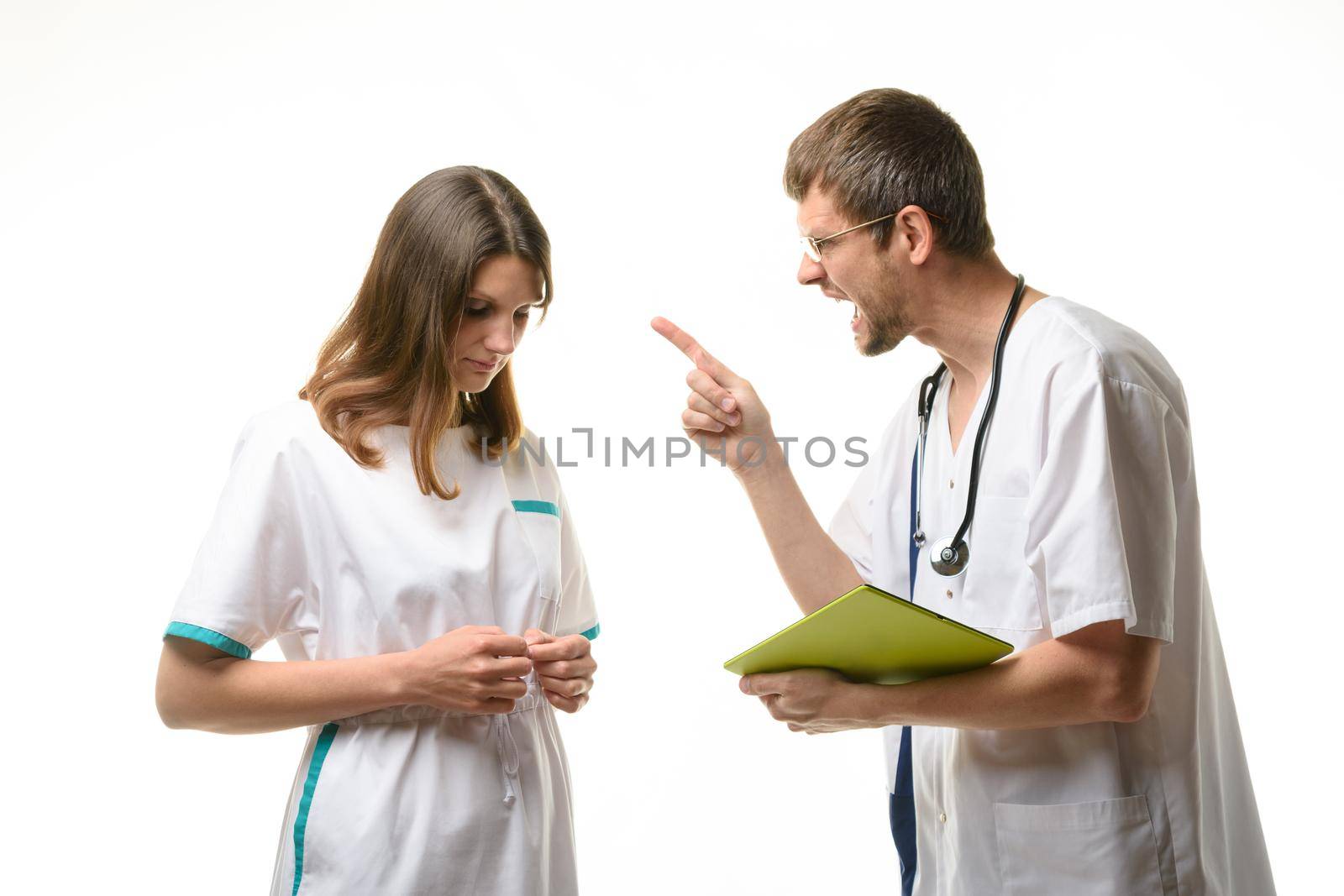 The doctor yells at the intern for an error in the patient's record