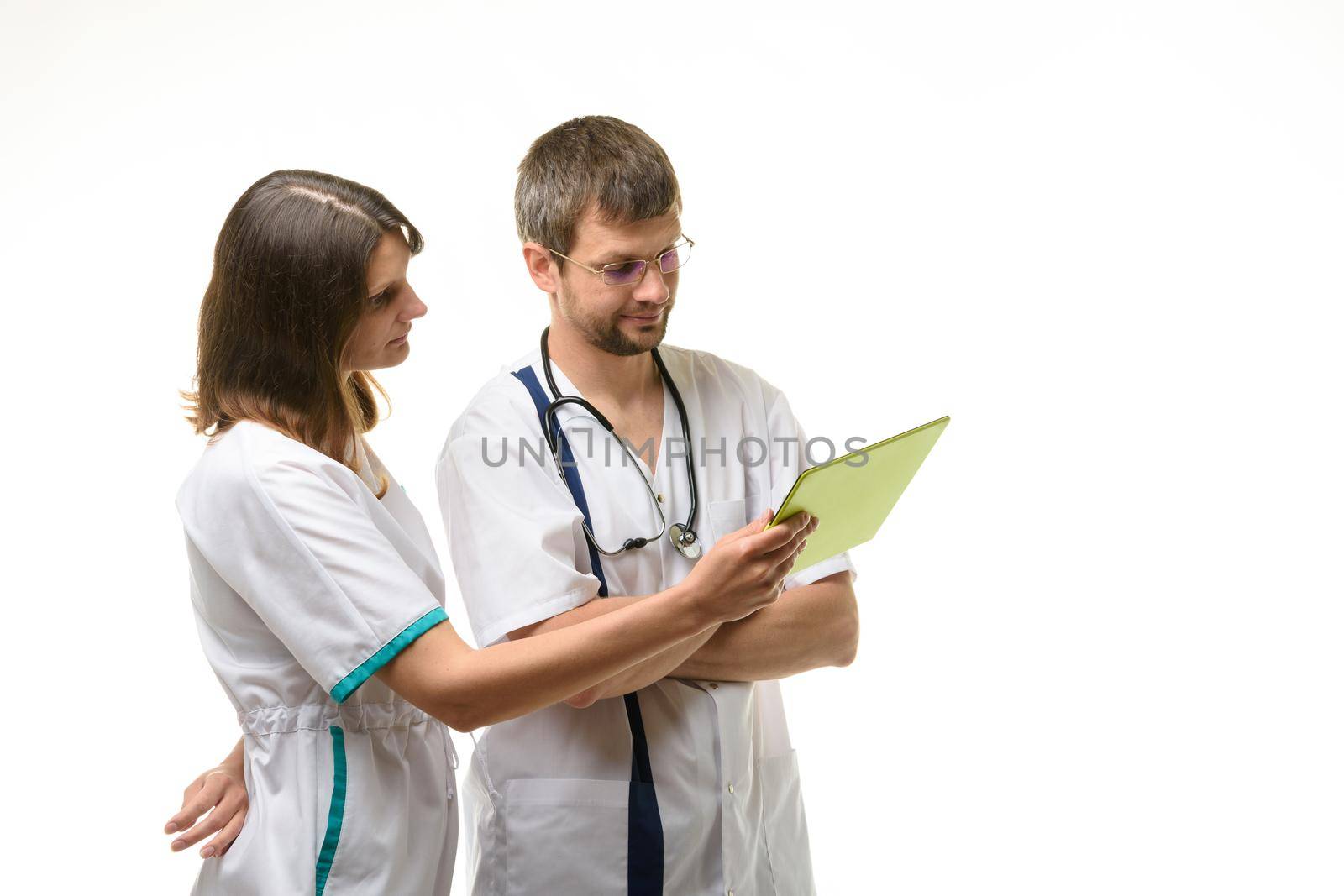 Two doctors discussing test results isolated on white background