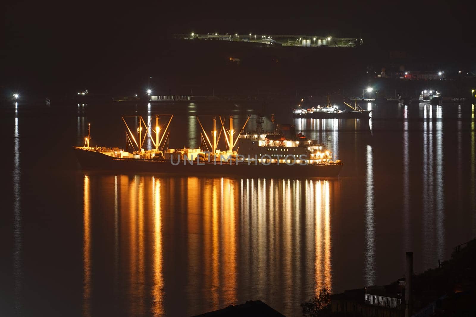 Vladivostok, Primorsky Krai. Ship with illumination against the sea