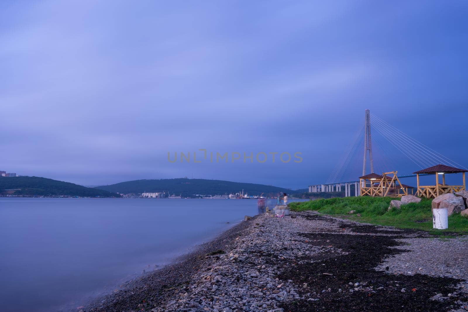 Seascape with coastline in blue hour. Vladivostok, Russia