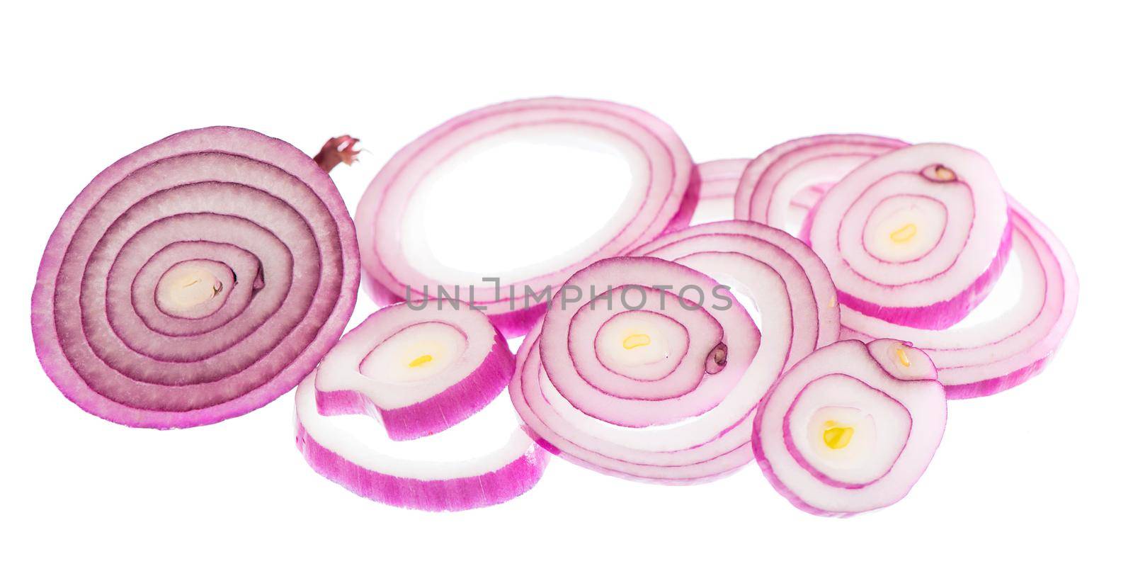 onion cut into rings drops on white background by aprilphoto