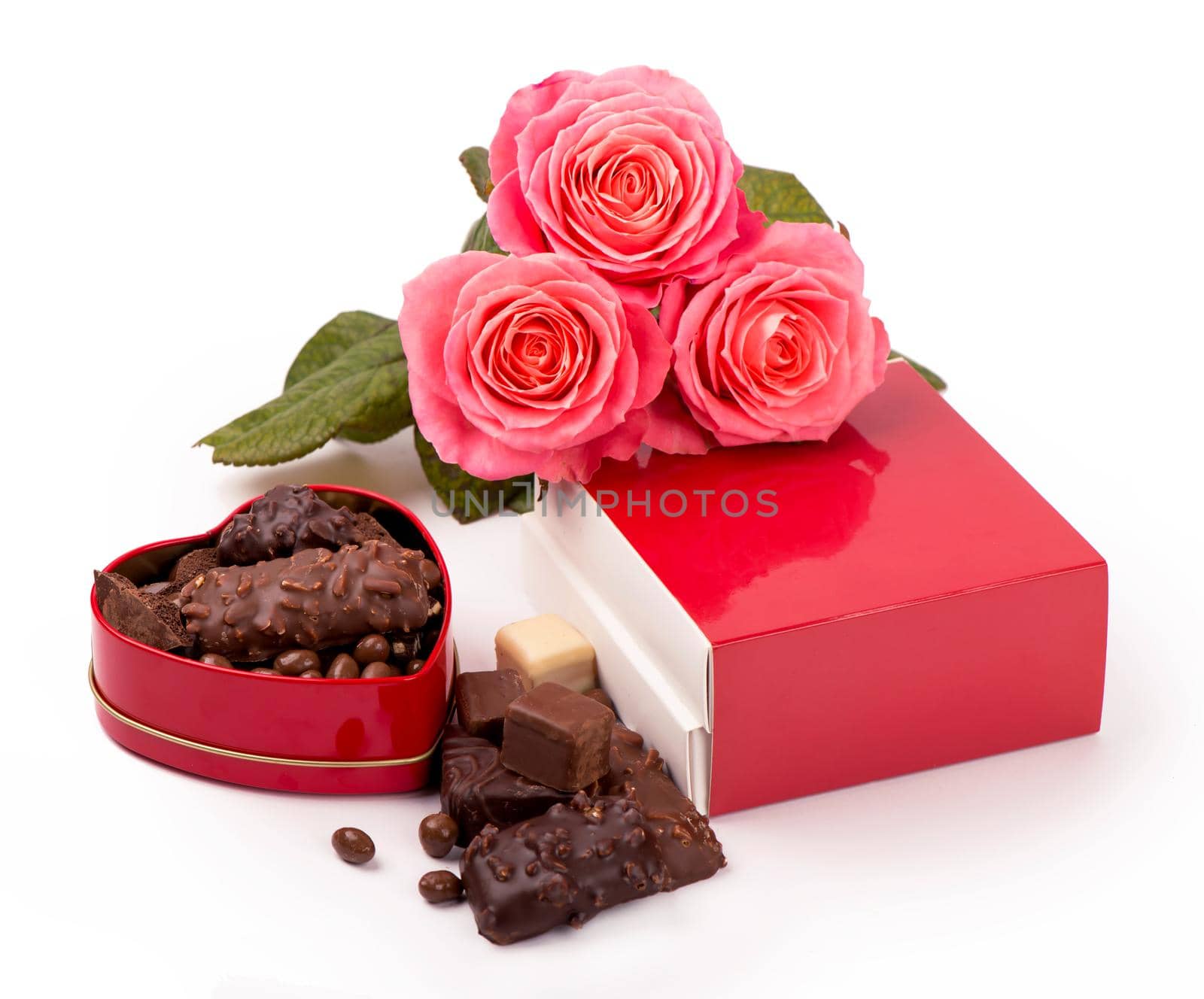 Beautiful rose and dark chocolate for valentine day on isolate white background.