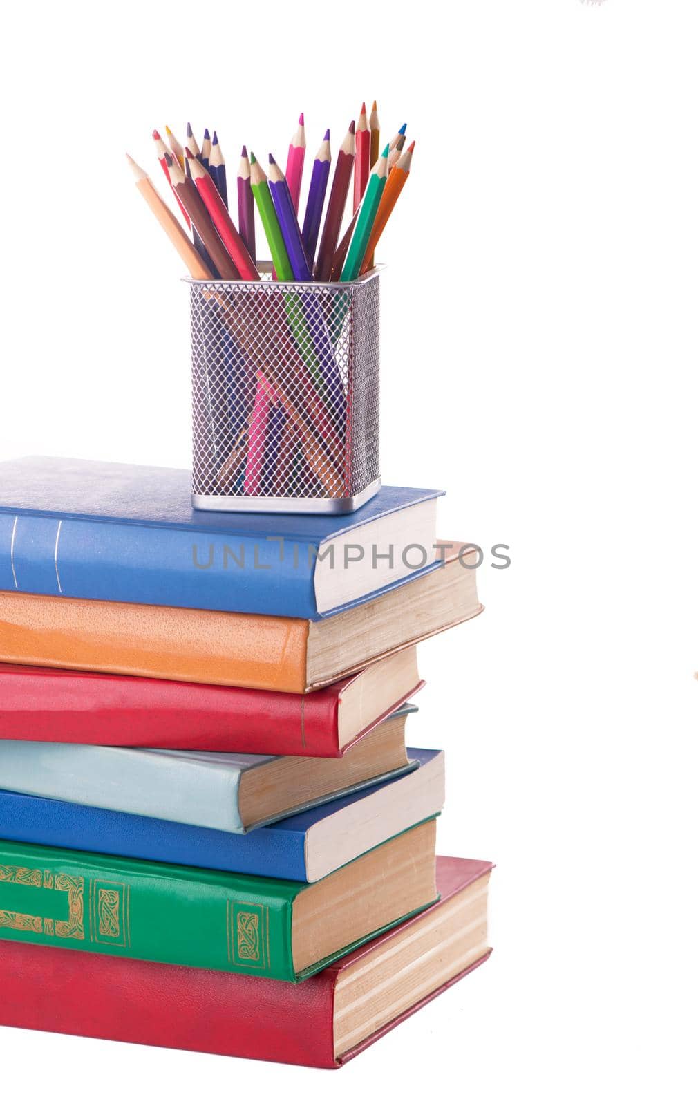 stack of Old books and a stand with colored pencils isolated on white by aprilphoto