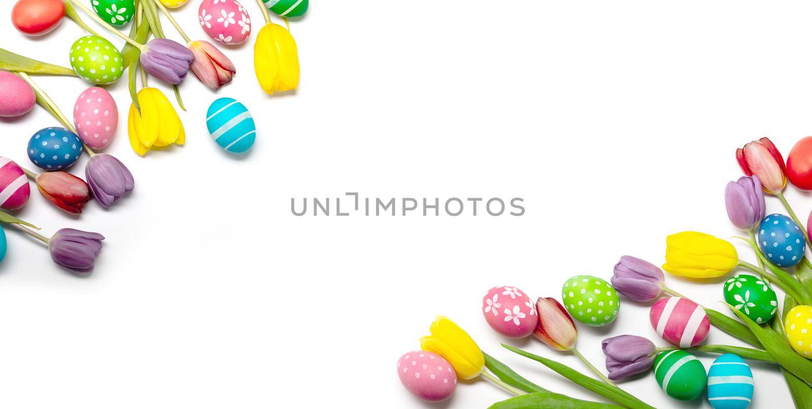 Easter tulips and eggs isolated on white background, border frame corner composition with copy space for text