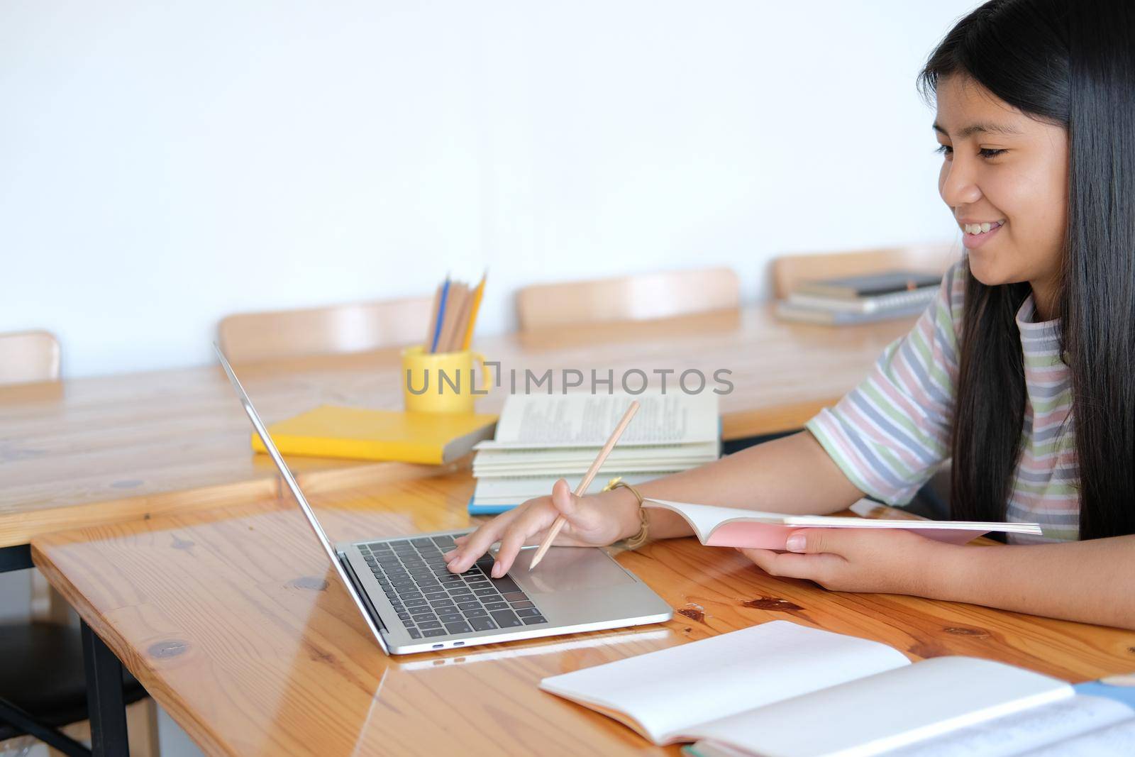 asian girl student studying learning lesson online. remote meeting distance education at home