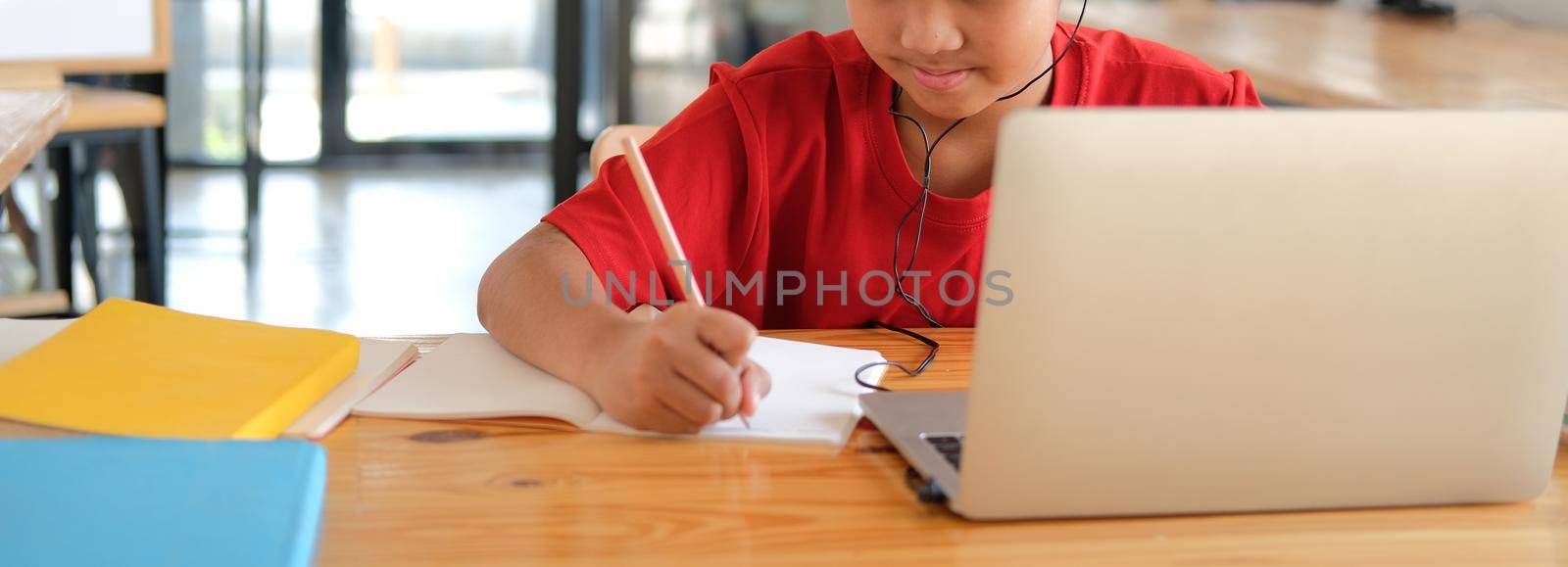 boy student studying learning lesson online. remote meeting distance education at home by pp99